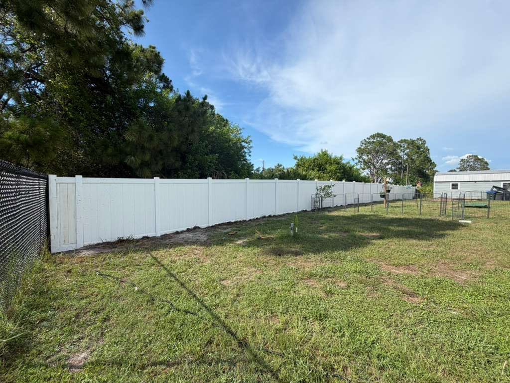 Black Chain Link and Vinyl Privacy Fence Installation in North Port by True Fence LLC
