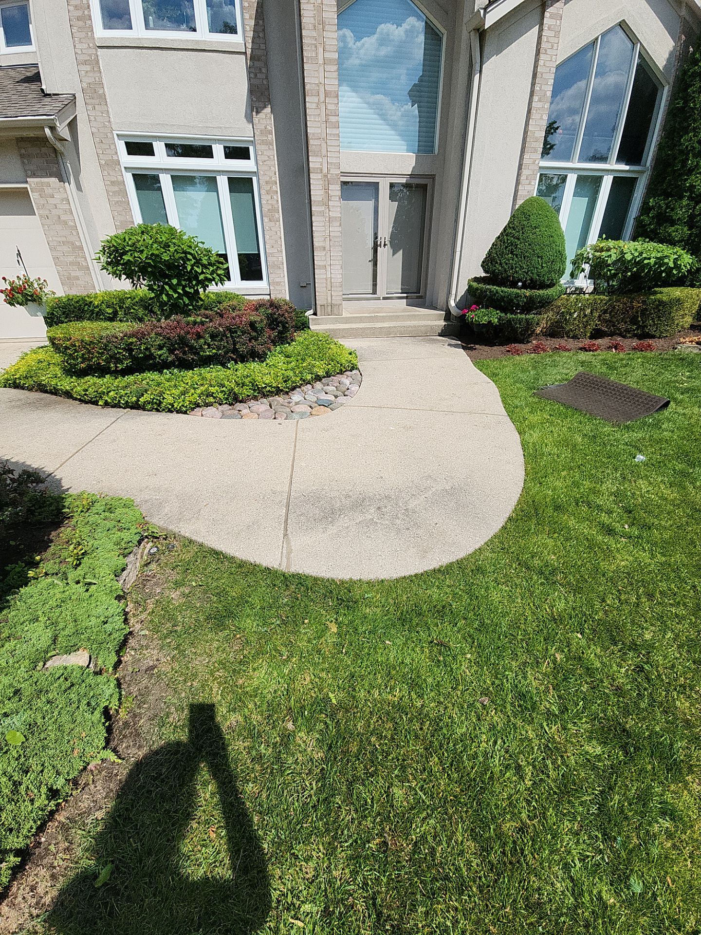 Aggregate concrete cleaning by Northern Power Washing LLC.