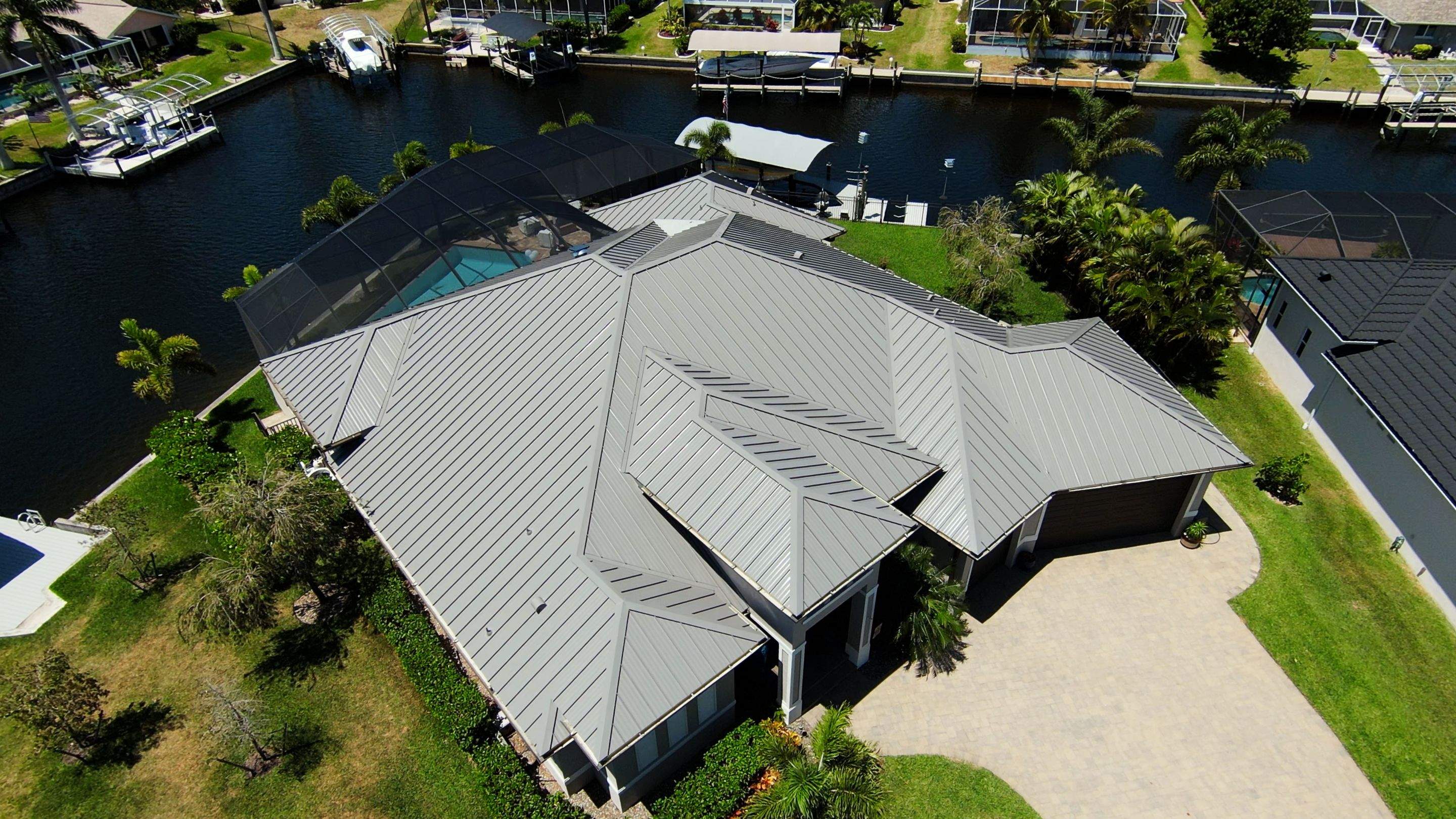 Residential Roofing Installation using Gulf Coast Metals Gulf Seam Panels by Four Peaks Roofing