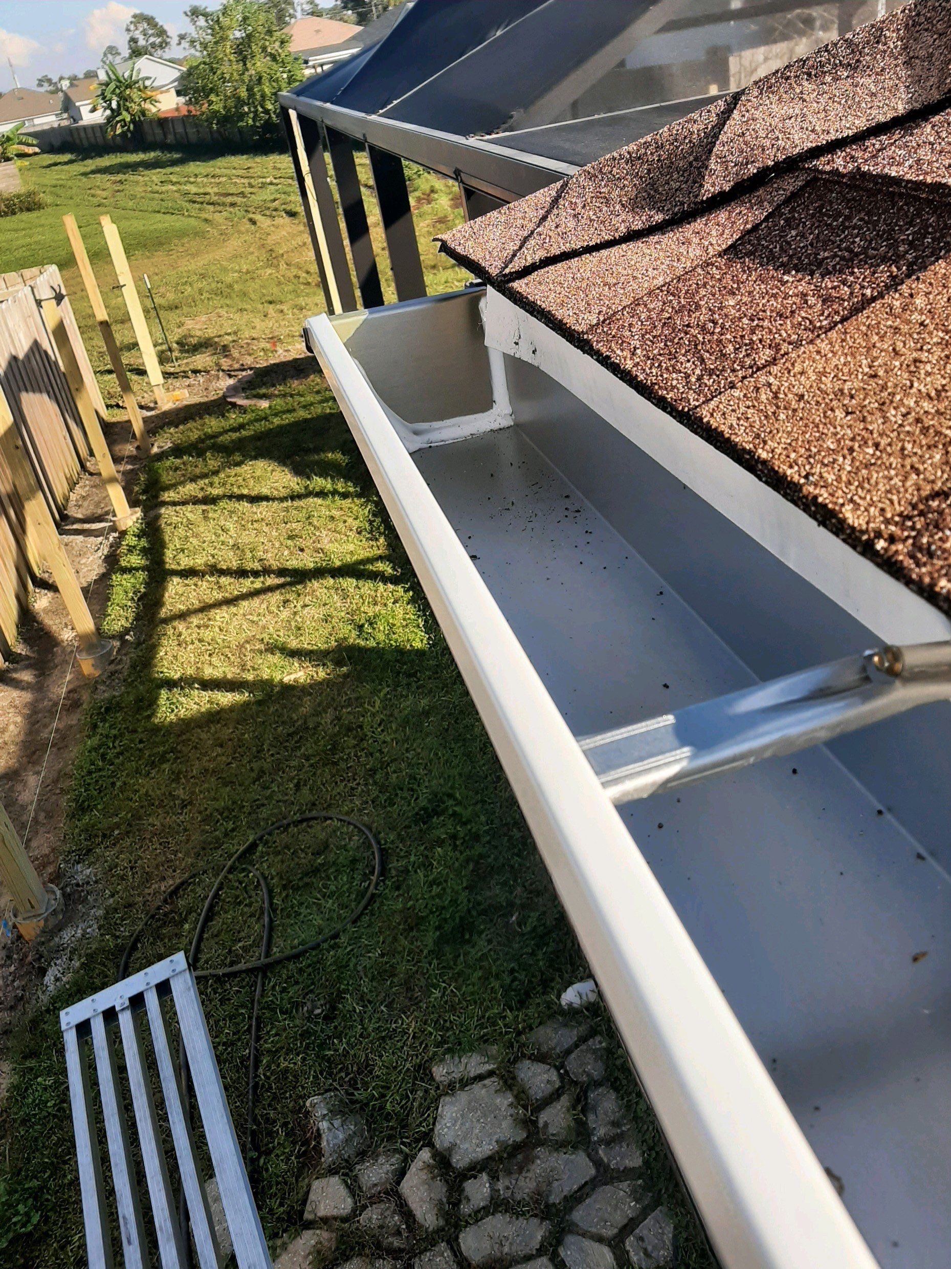 Seamless Gutter Installation using White K-Style Gutters by Gutter Professors