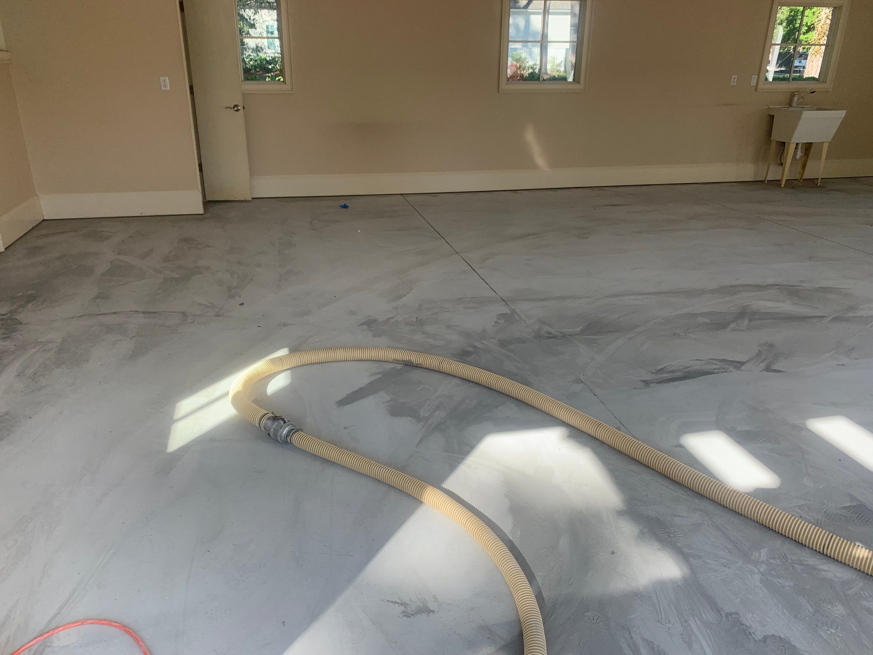 Garage TransFLOORmation using Sandstone by Innovative Concrete Coatings 