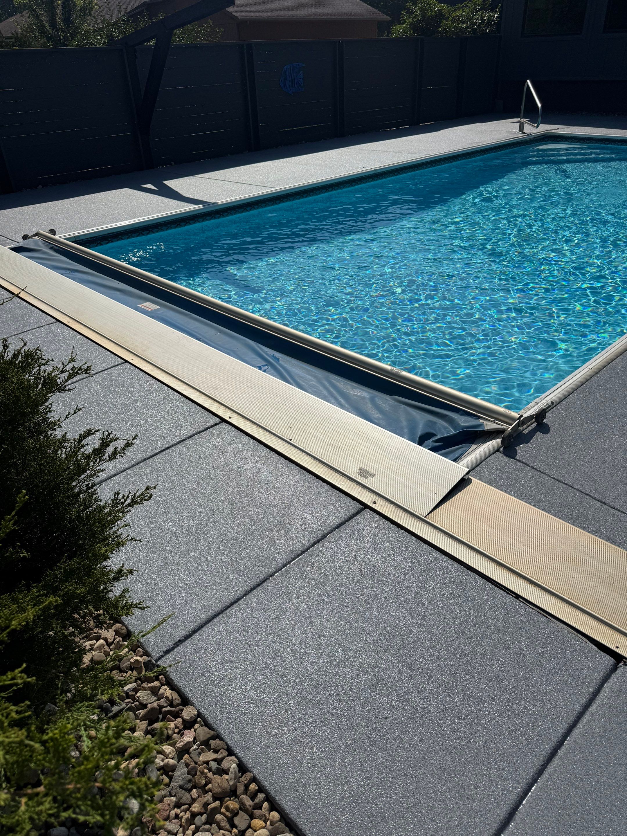 Garage Floor and Textured Pool Deck Coating in Sioux Falls by Select Painting, Coatings & Garage Cabinets