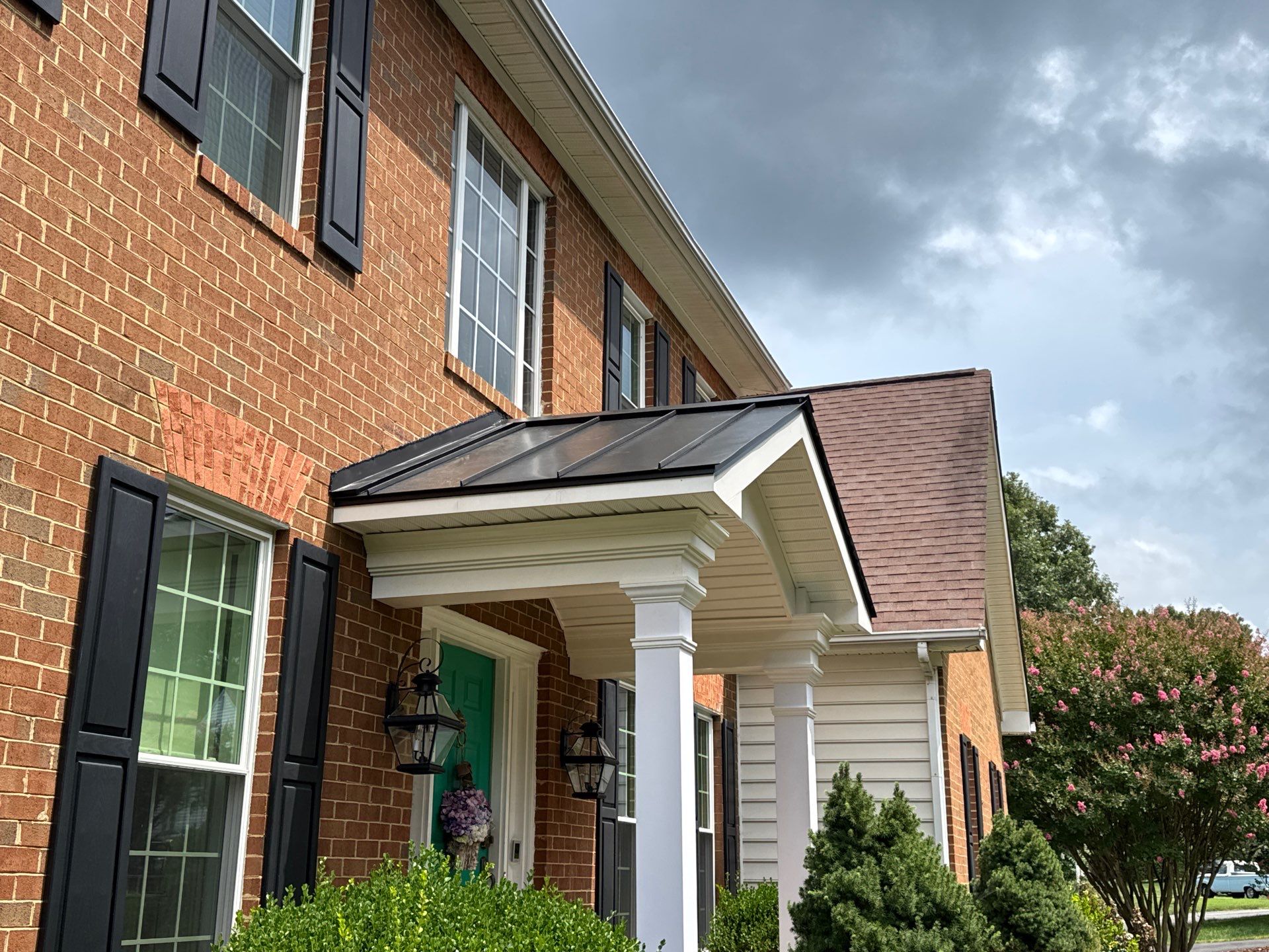 Standing Seam Metal Porch Roof Installation in Mechanicsville, VA by Cade Construction