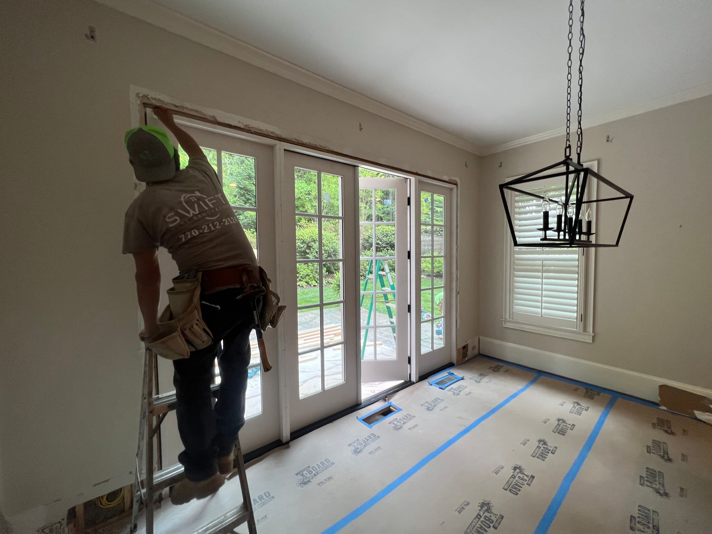 Atlanta French Door Installation with Custom Wood Overhang and Flagstone Patio by Swift Home Renovations