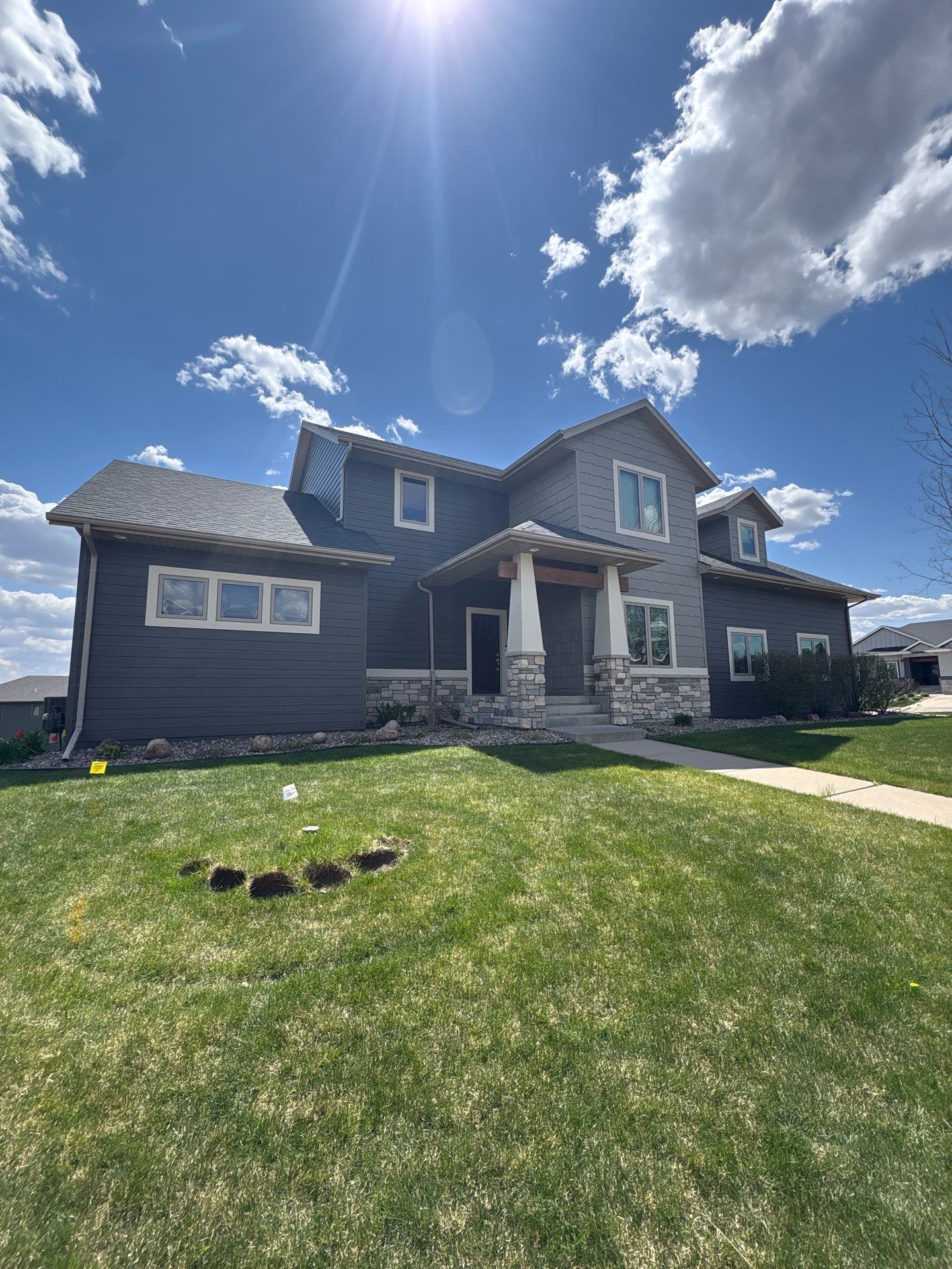 Residential Exterior Painting and Color Update in Sioux Falls by Select Painting, Coatings & Garage Cabinets