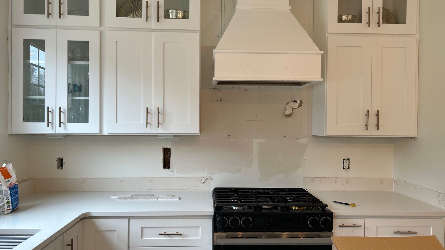 Lovely neutral backsplash  by Footprints Floors of Nashville