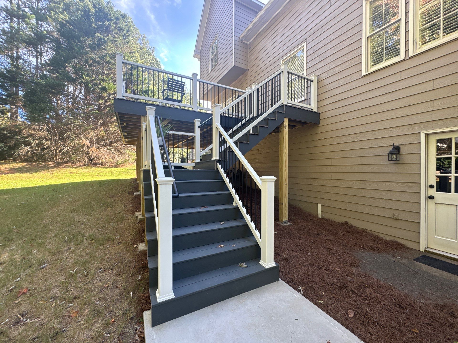 Elevated Multi-Level Composite Deck Replacement in Duluth, Georgia by Swift Home Renovations