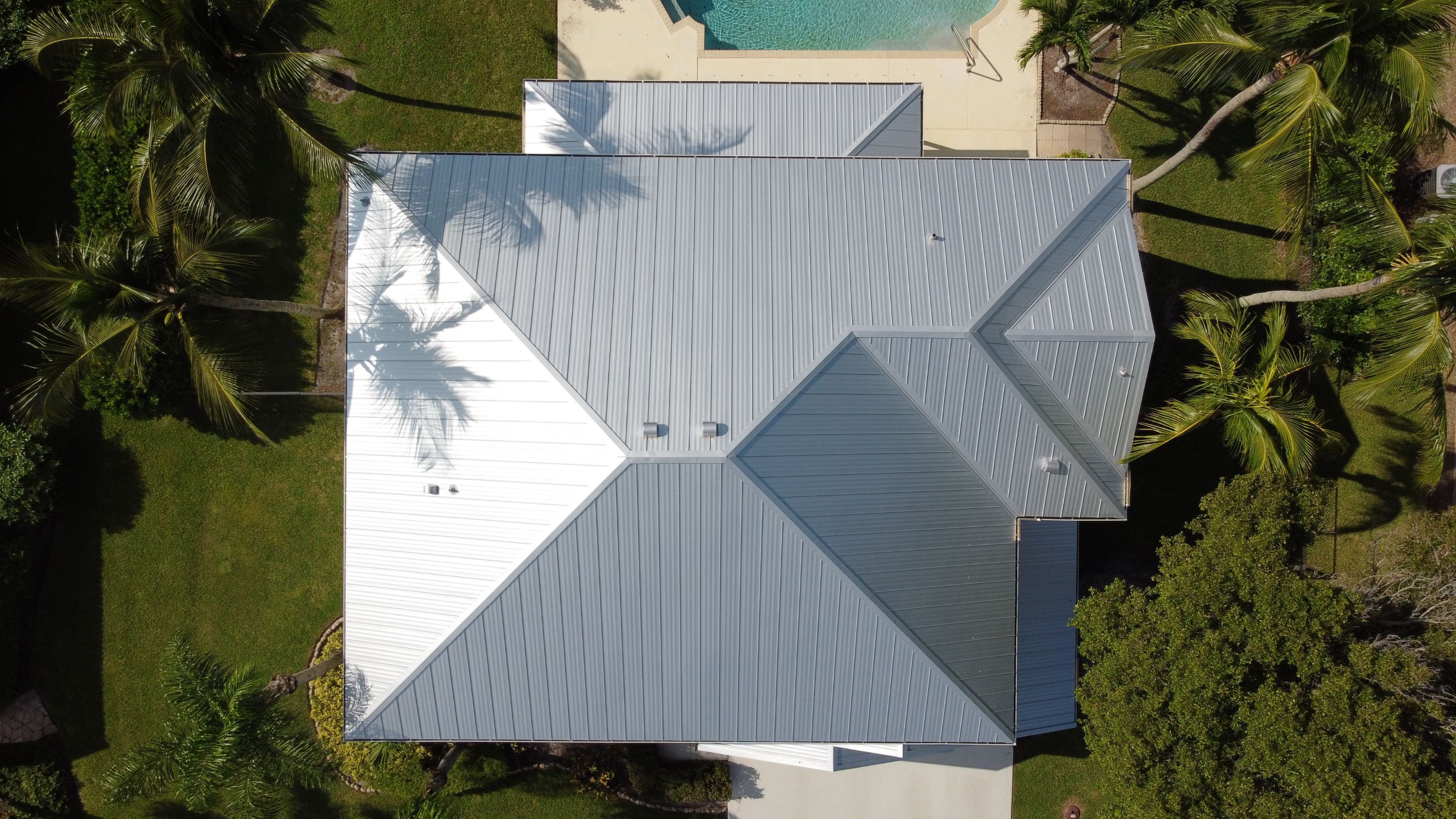 Residential Roofing Installation using 1" Nail strip metal roof by BLUES BROTHERS CONSTRUCTION CORP