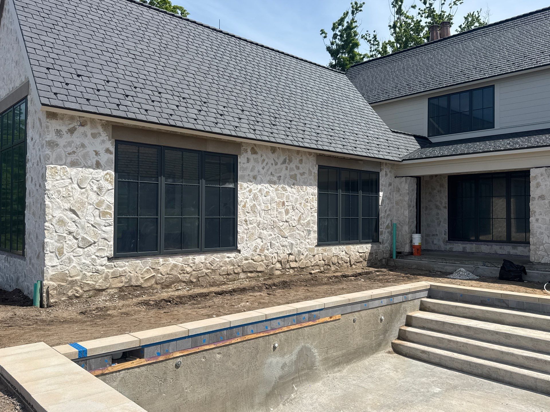 Half Round Gutter Installation for Petoskey Residence by Rainbow Seamless Systems