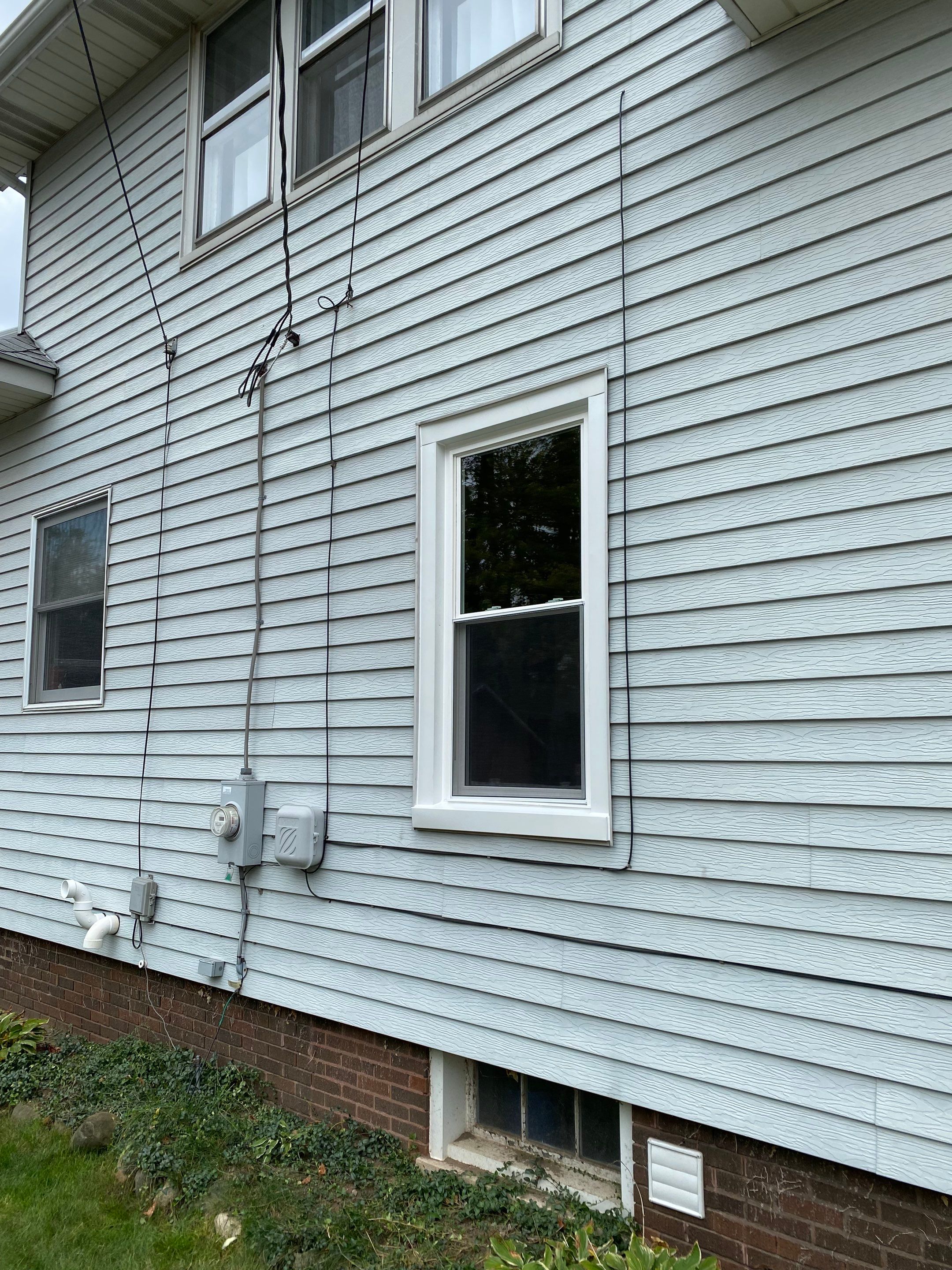 Window Installation using vinyl windows by Kraz Construction