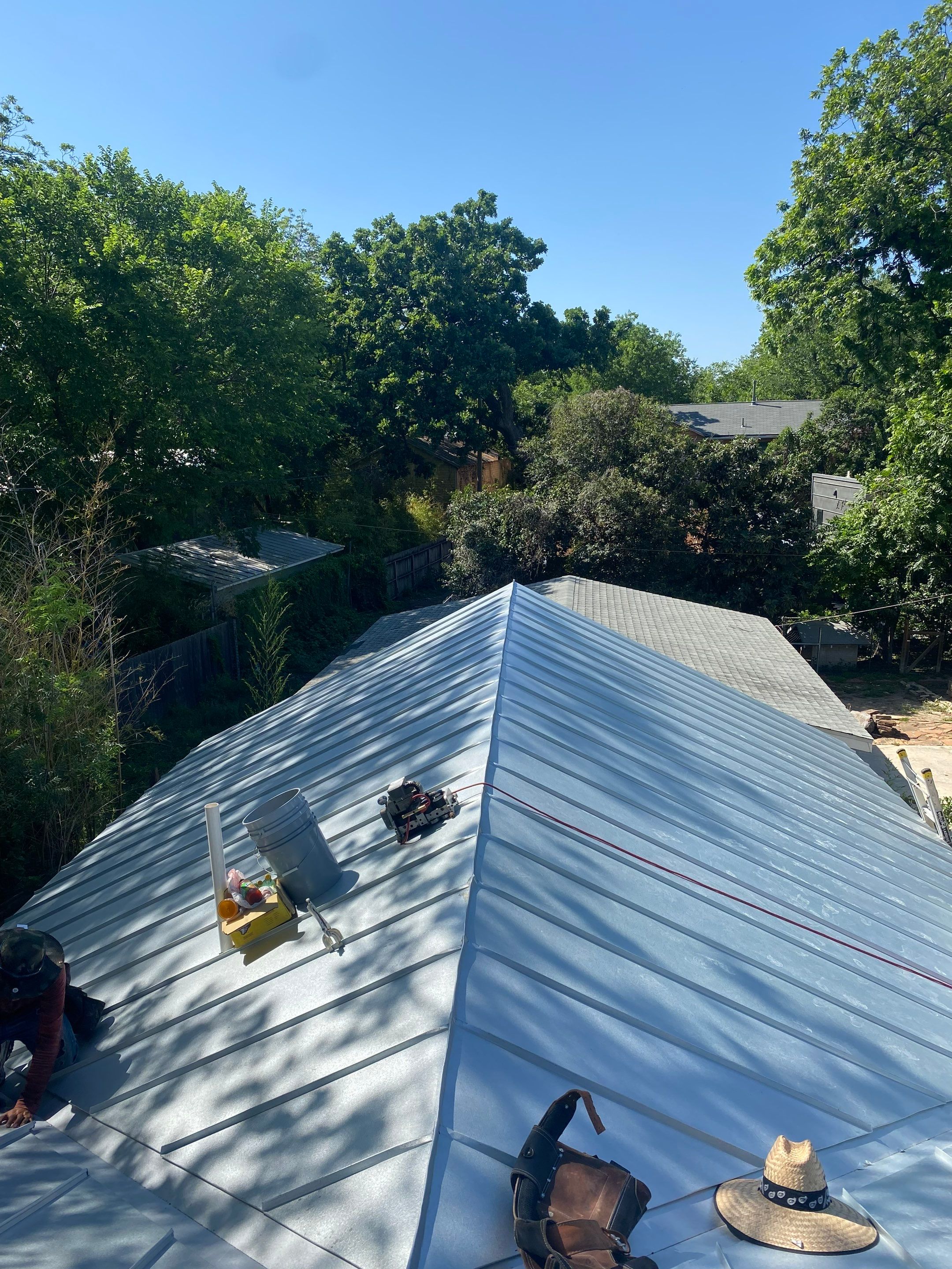 Residential Metal Roof Installation using McElroy Metal by Premier Roofing and Contracting