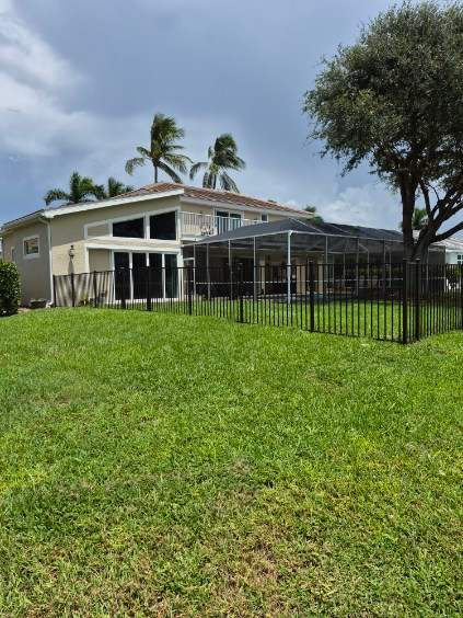 Bronze Aluminum Perimeter Fence Installation in Fort Myers by True Fence LLC