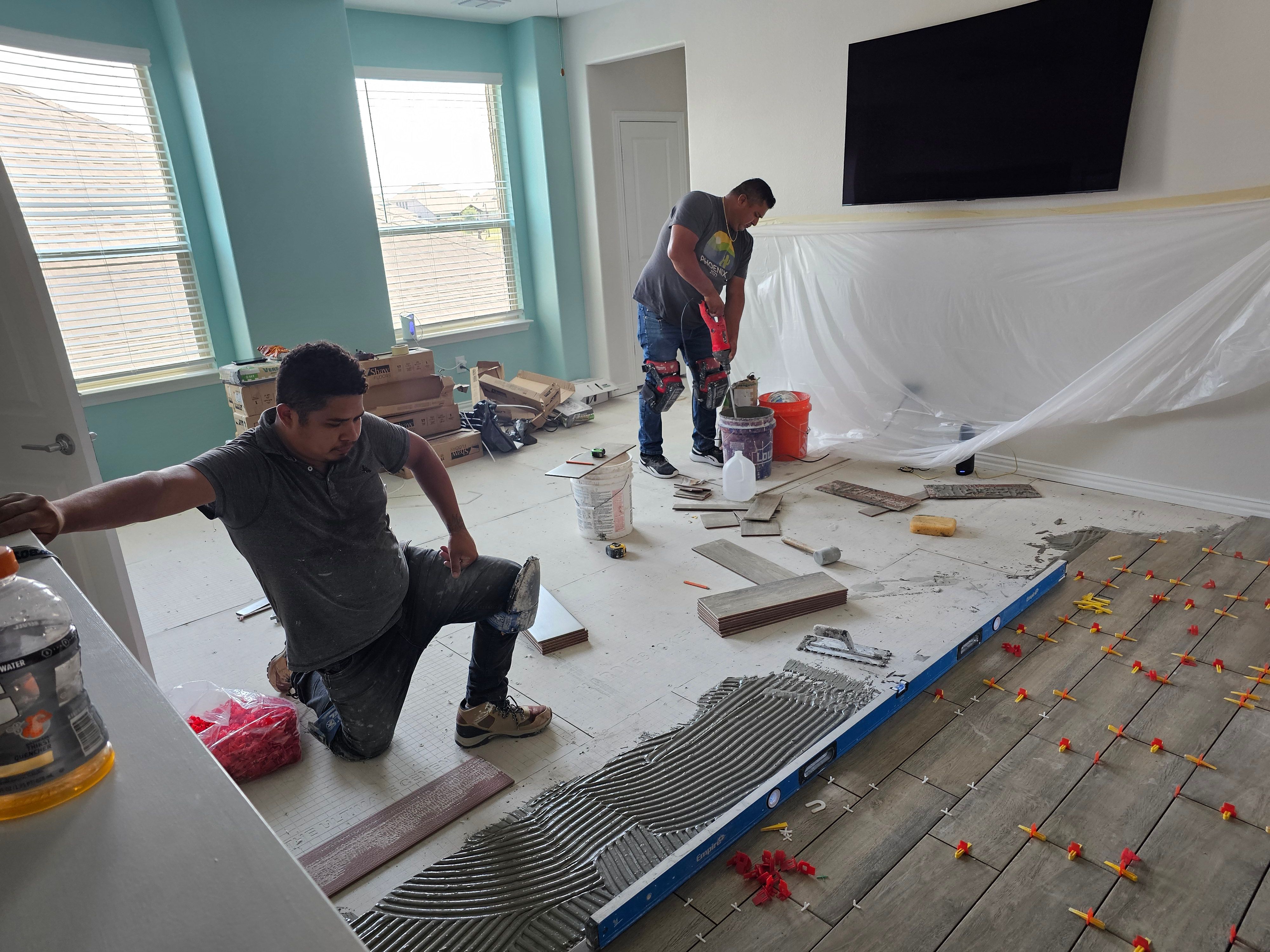 Carpet replacement with Tile and Red Oak Stairs by EL-GC LLC 