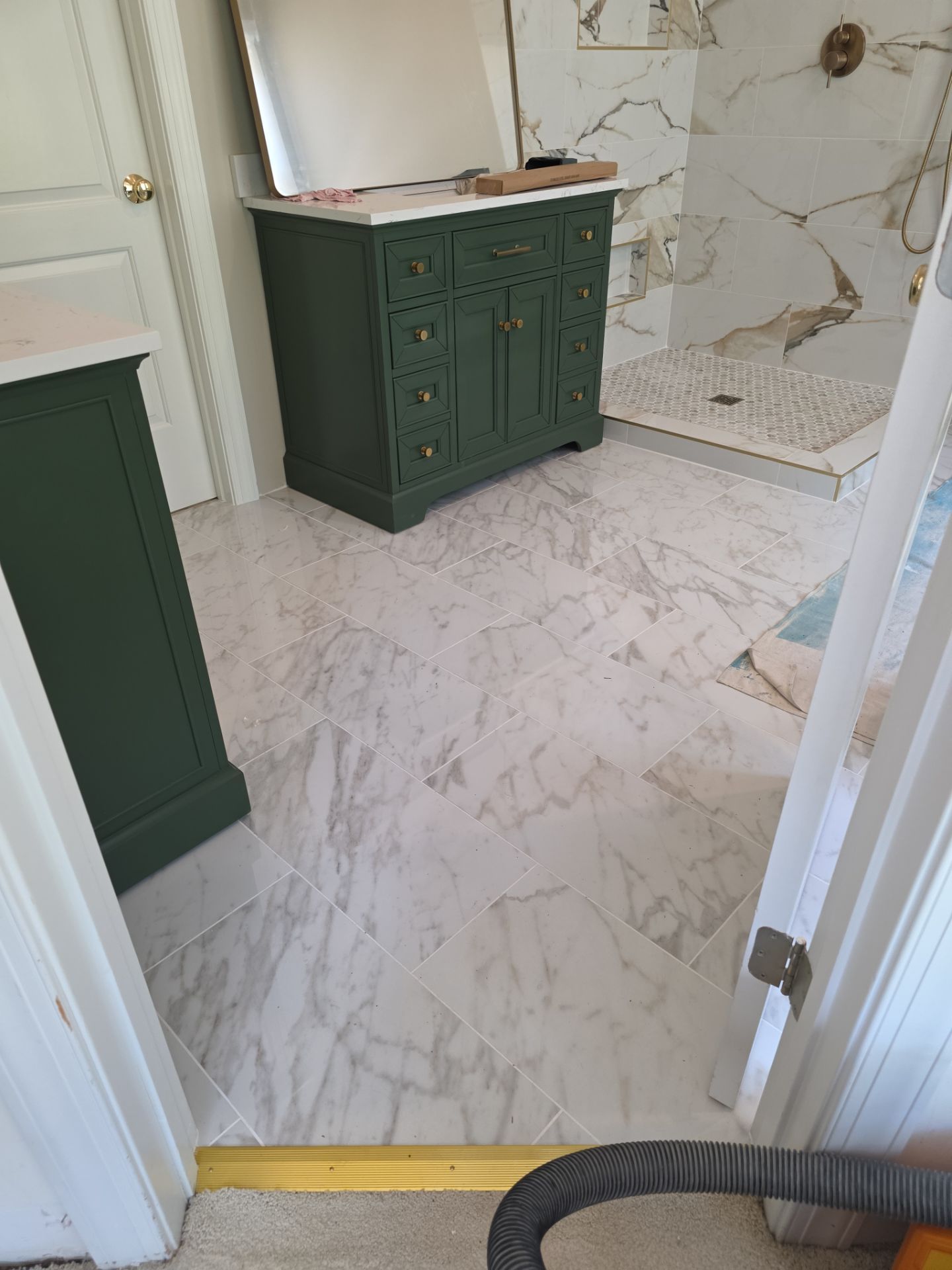 North Raleigh Retreat: A Water-Damaged Bath Reimagined by Elite Remodeling and Design LLC