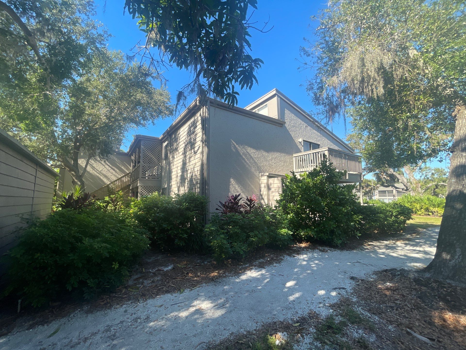 Clean Gutters and Roof in Sarasota FL by Gutter Professors