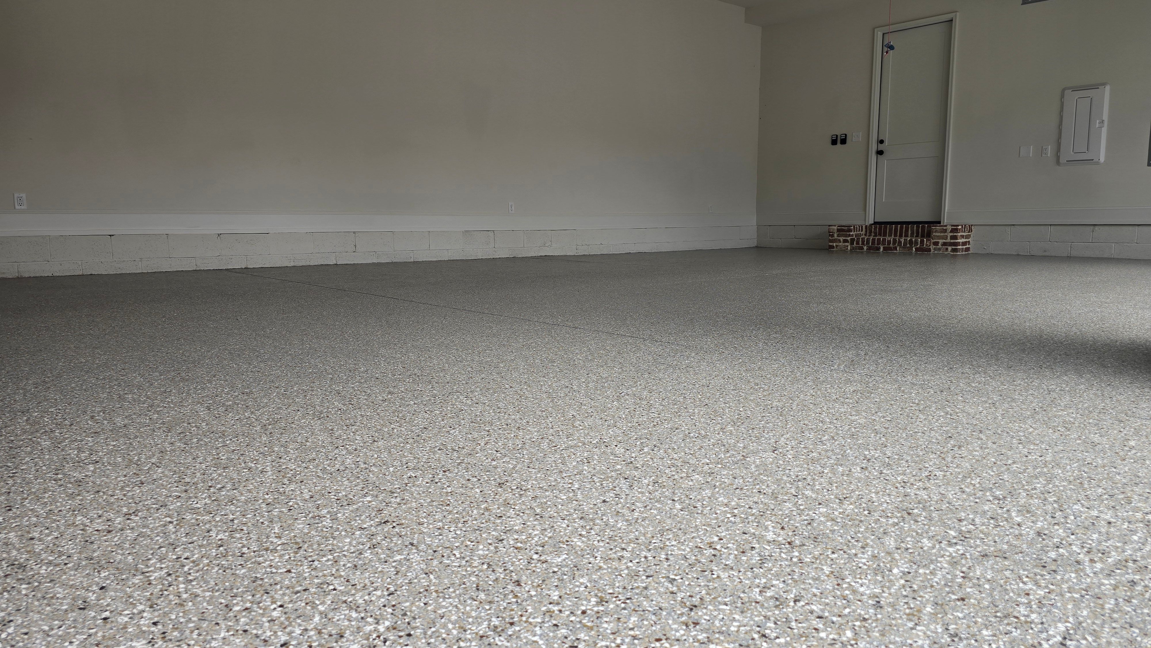Garage Using Creekbed  by Elite Floor Solutions