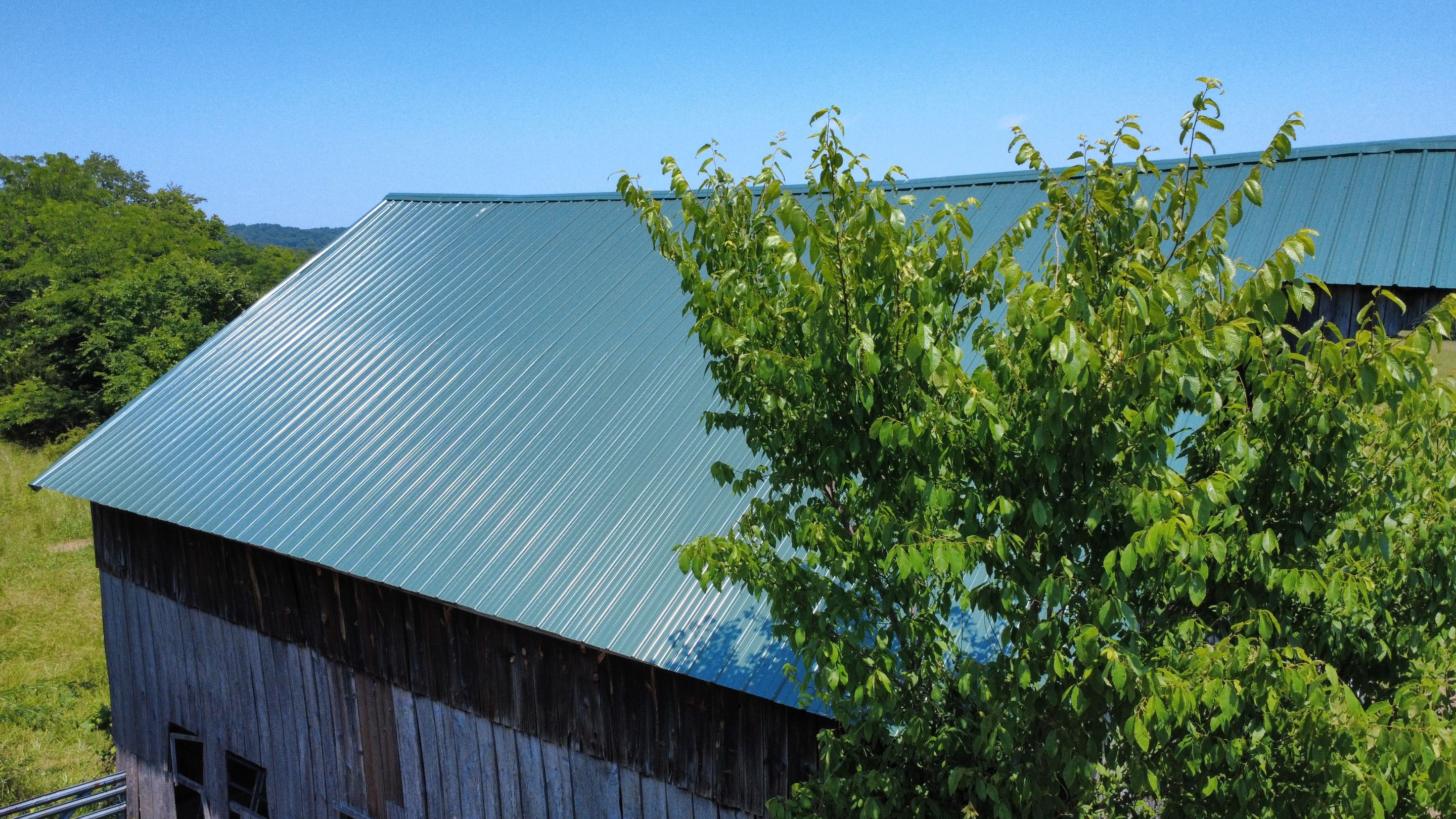29 Gauge G-Rib Metal Roof Install - Color Evergreen  by Titan Commercial & Residential Roofing 