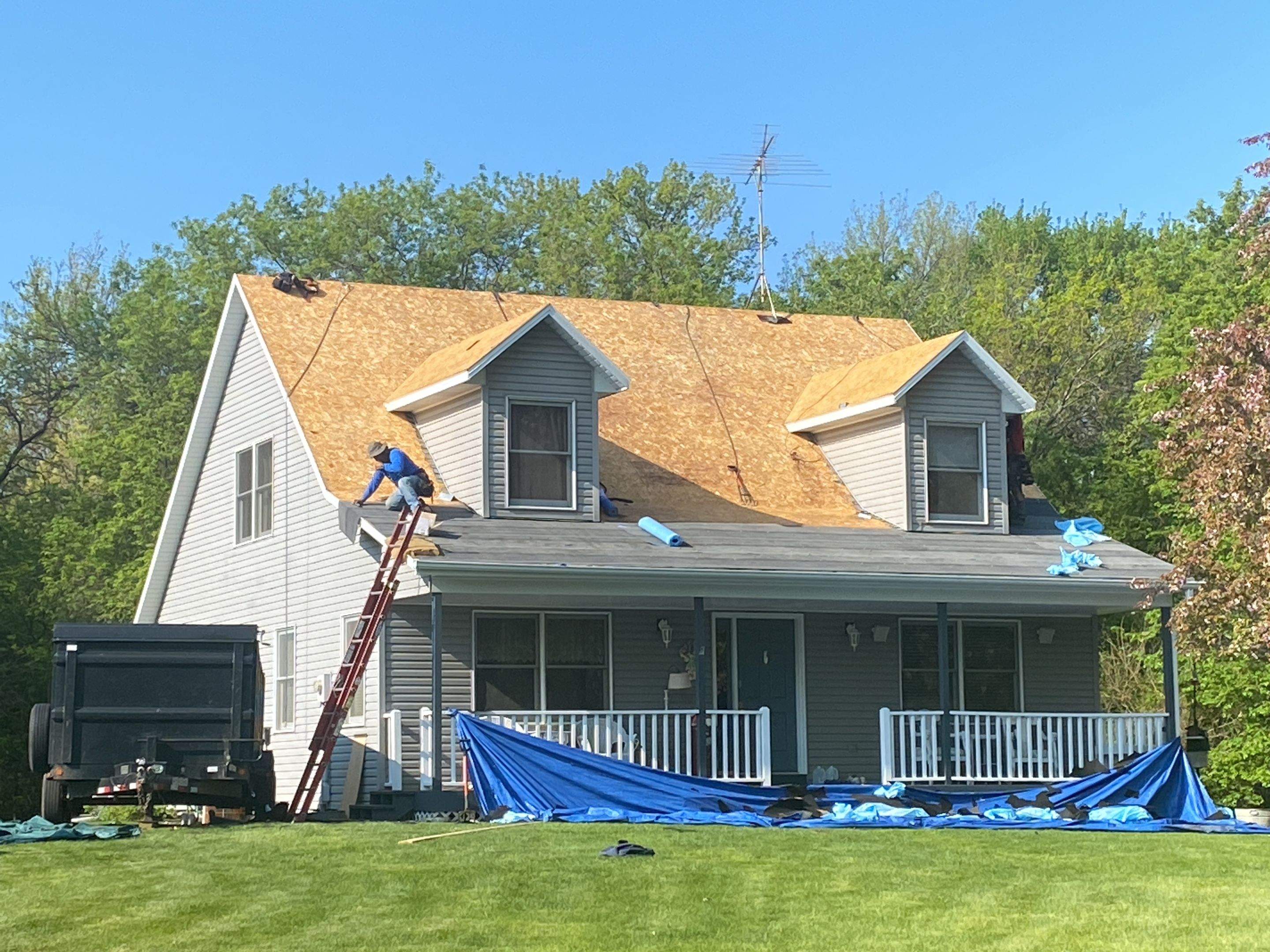 Residential Roofing Installation using Certainteed Landmark Moire Black by MODERN EXTERIOR SYSTEMS