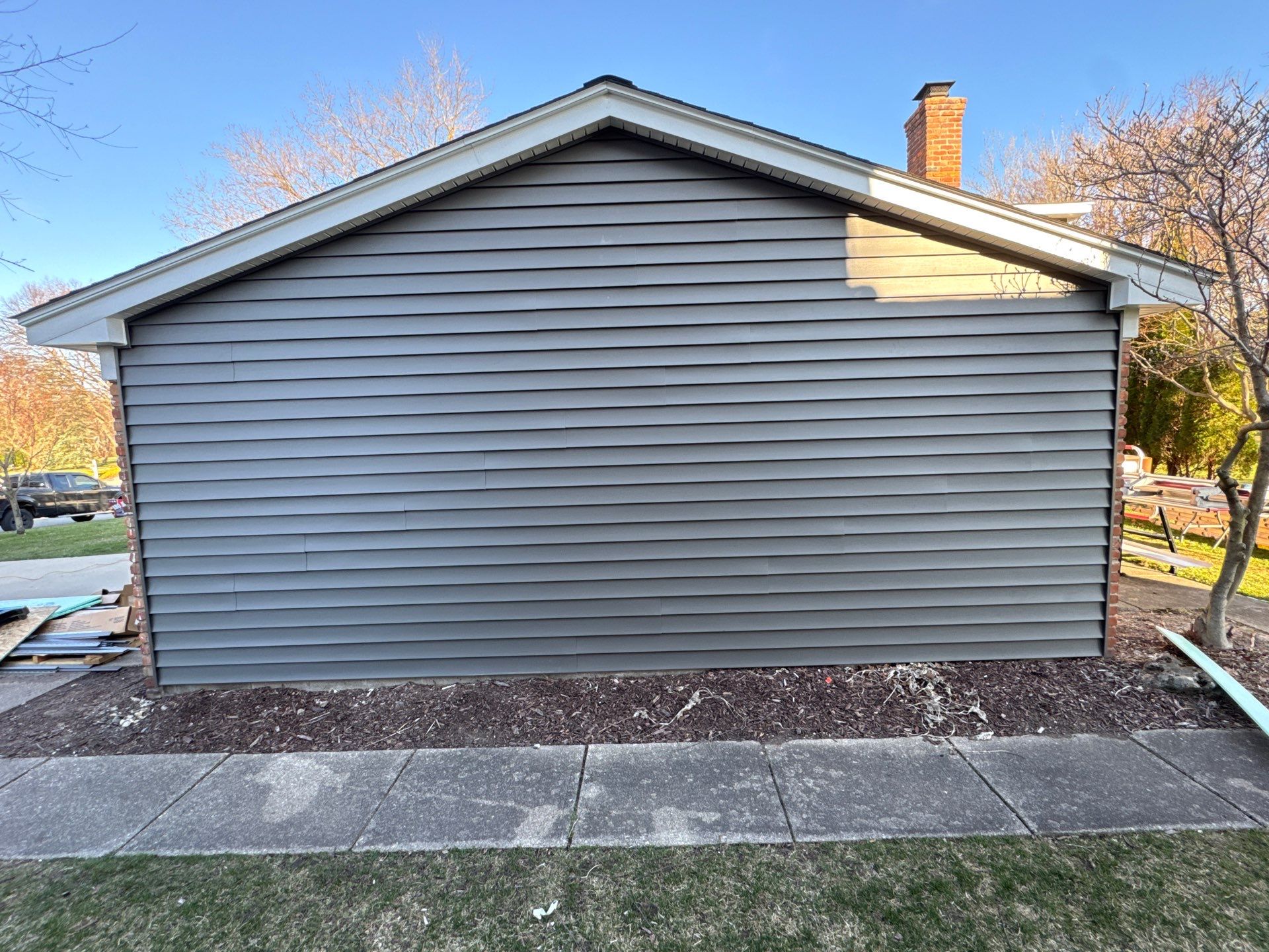 Siding Replacement using Alside Charcoal Smoke and Roof Replacement using Owens Corning Peppercorn by 180 Contractors