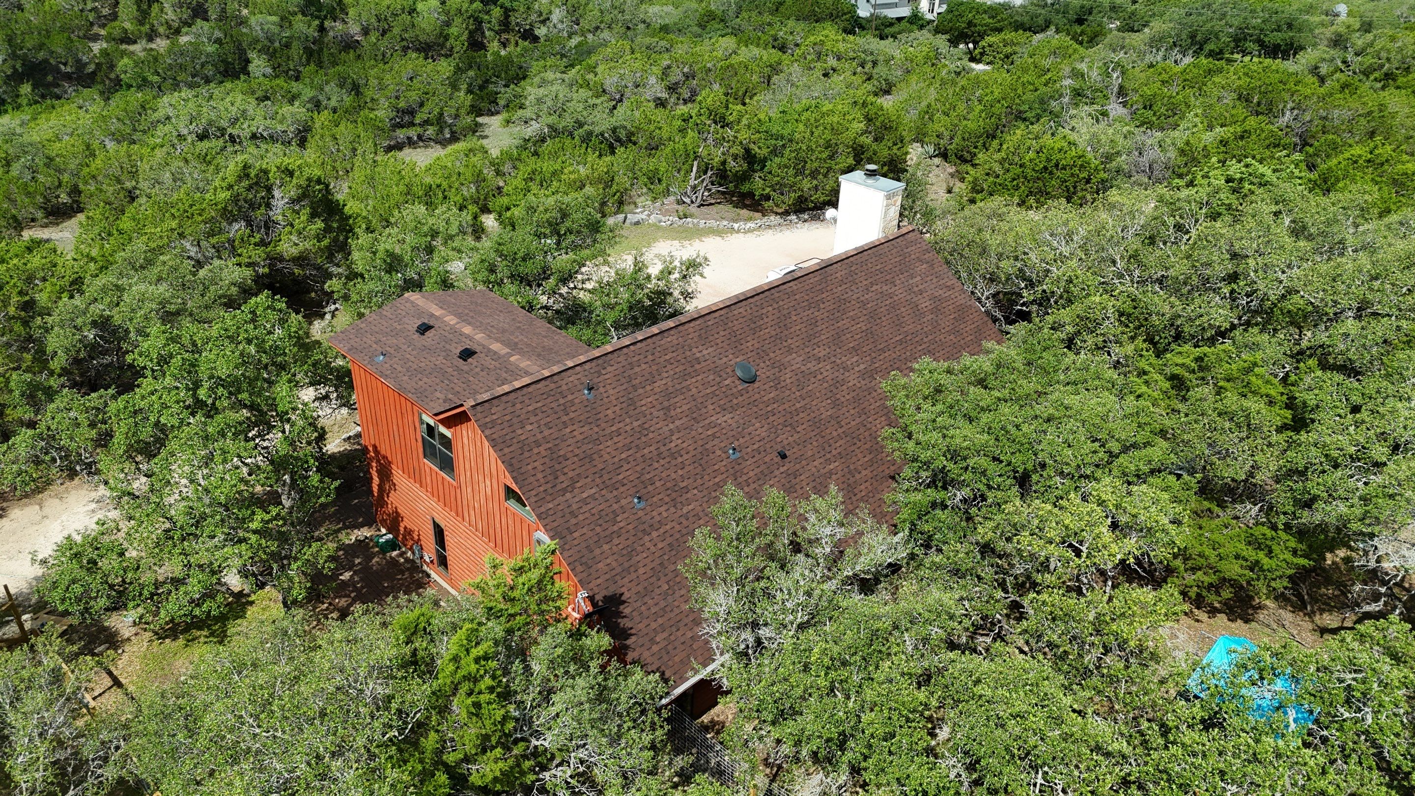 Residential Construction using TAMKO - Titan XT - Rustic Hickory by Action Exteriors Austin