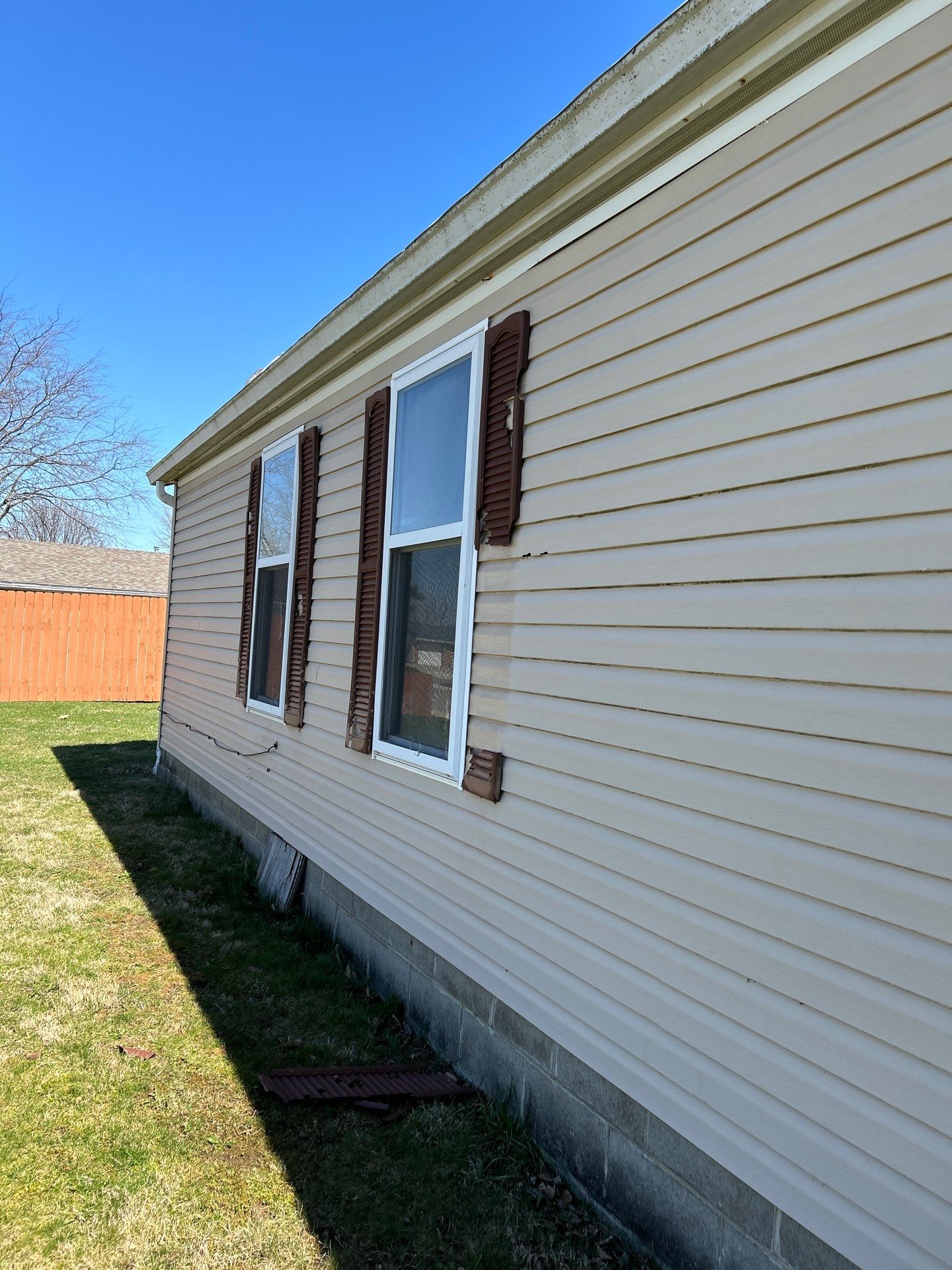 Roof and Siding Replacement using Norandex Cedar Knoll Graphite Siding and Owens Corning Durations in Onyx Black by WIW Enterprises Inc