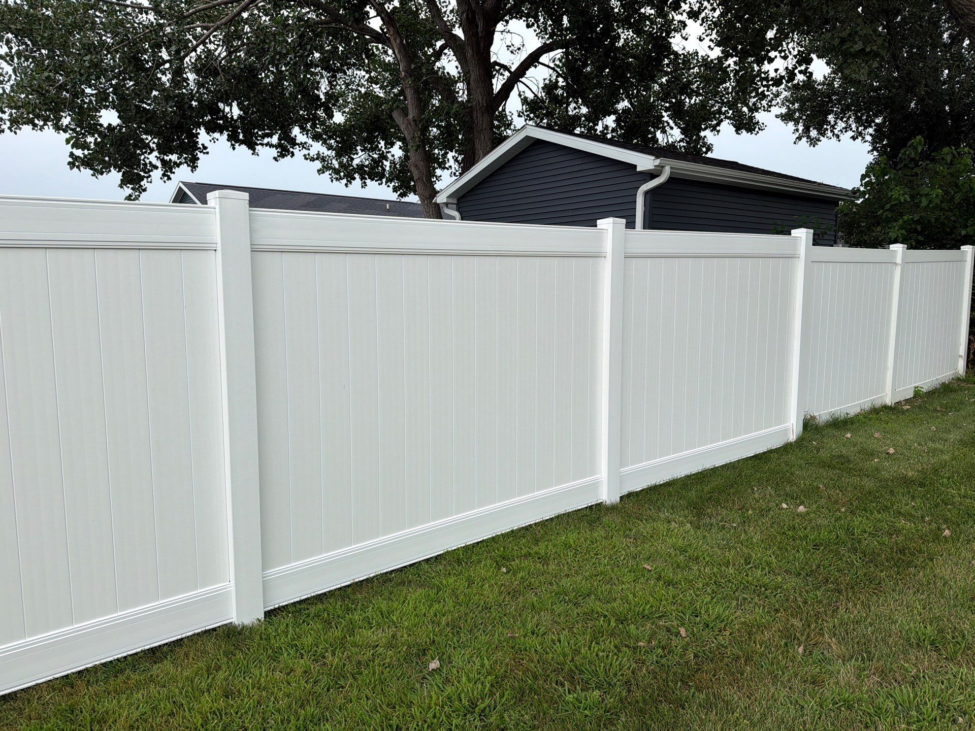 White Vinyl Privacy Fence and Double Gate Installation in Jesup by Perfect Picket Fence and Stain