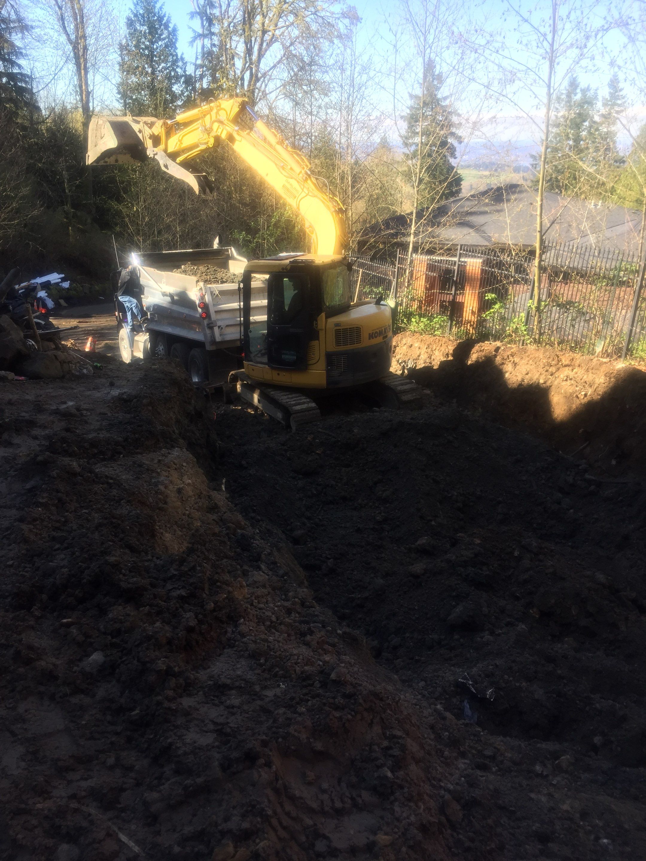 Asphalt Driveway and Stamped Concrete Patio Finish  by Jireh Asphalt & Concrete Inc 