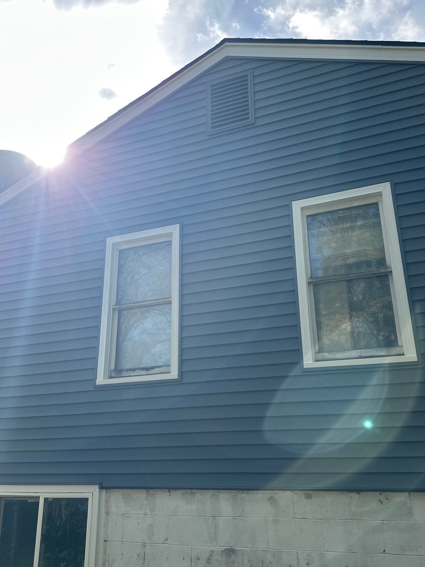 Feeling Blue in Weston Mo - Time for a Makeover by EEC Windows, Siding & Roofing