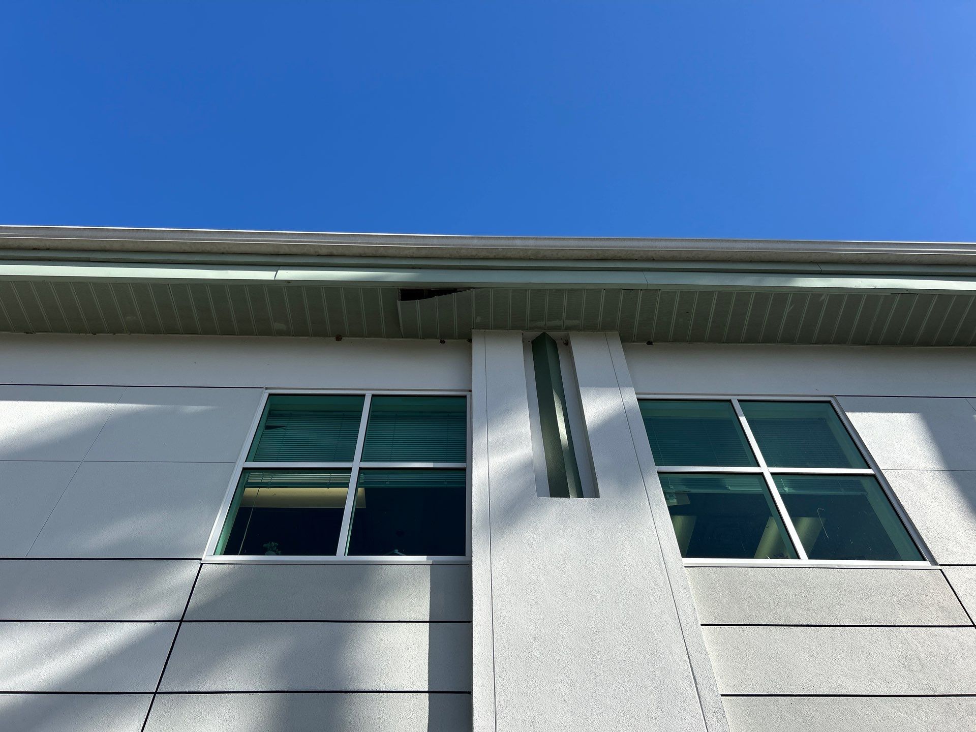 White Soffit and Fascia Repair Project in Sarasota FL by Gutter Professors