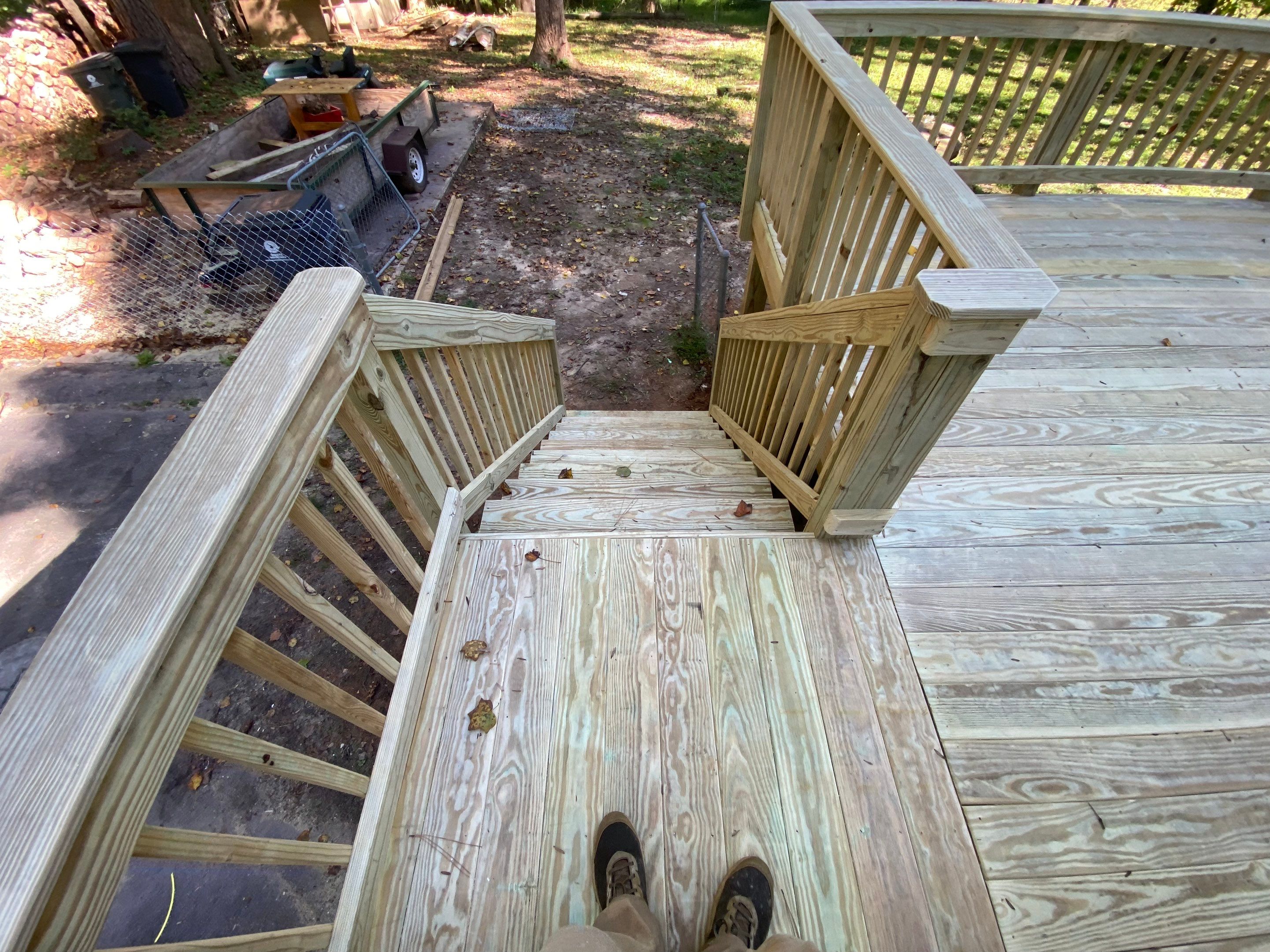 Custom Elevated Pressure-Treated Wood Deck Installation in Raleigh by The Remodeling Company