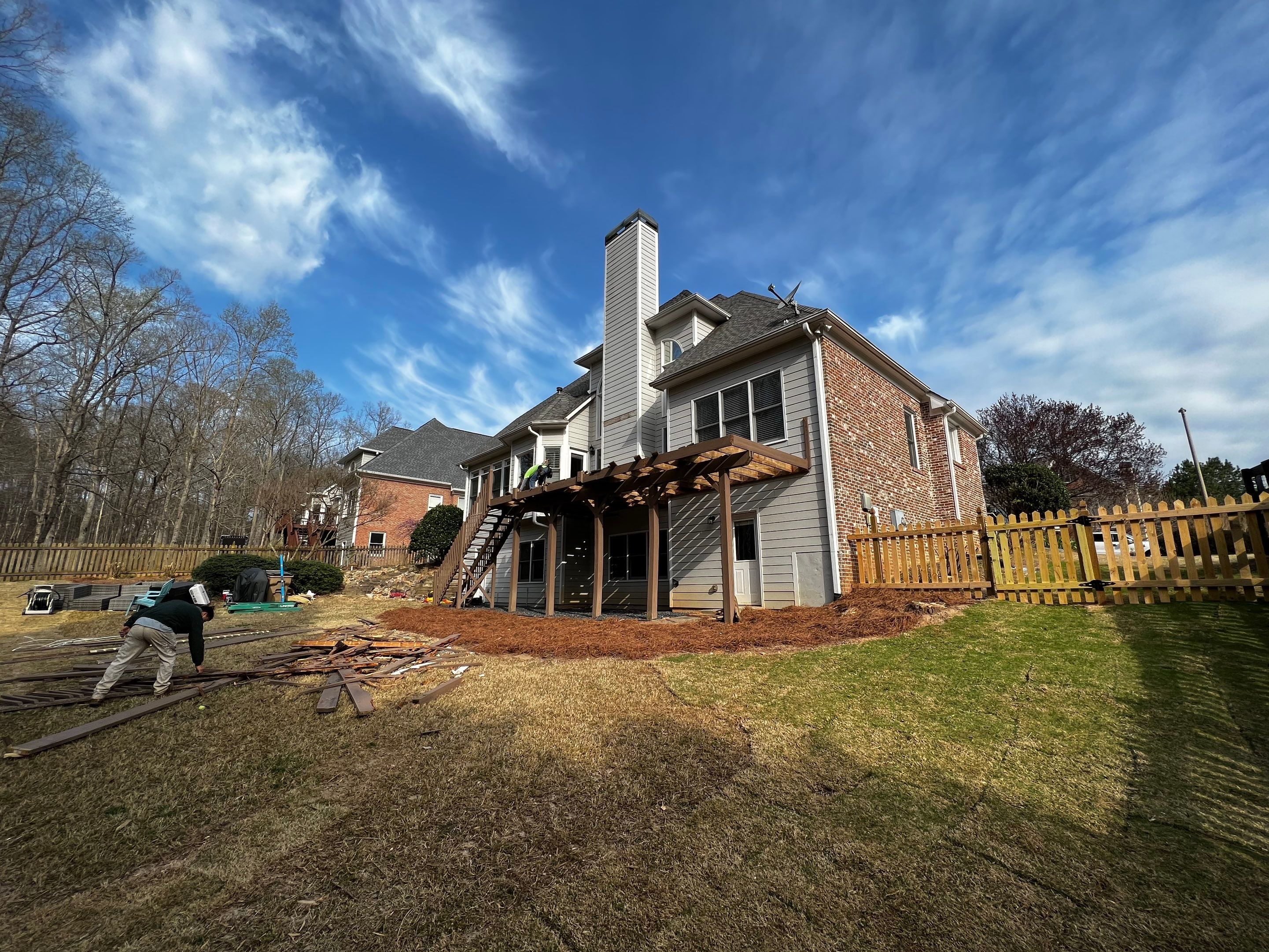 Elevated Grey Composite Deck Installation in Woodstock by Swift Home Renovations 