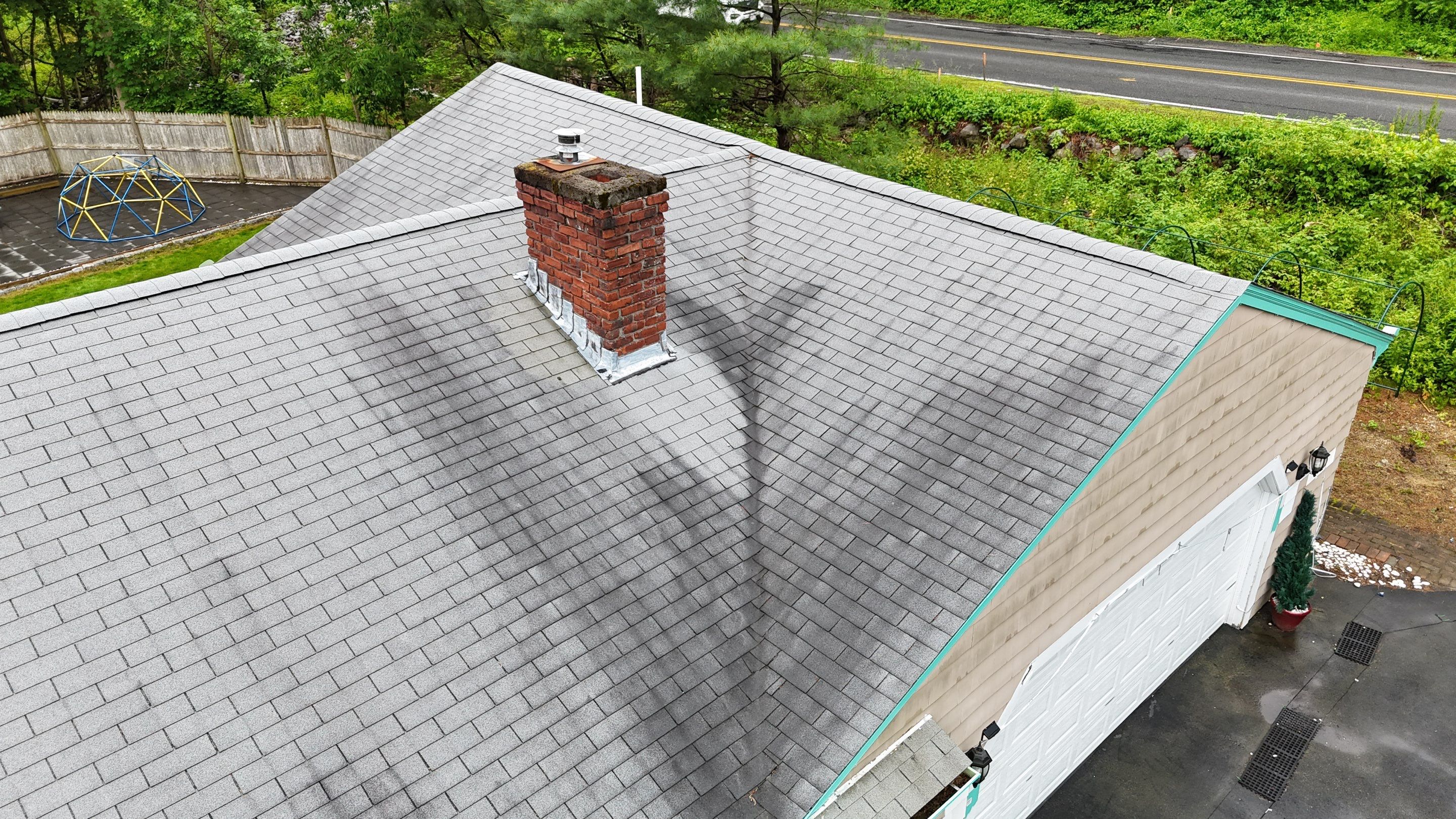 Roof Replacement with Gutter Guards – Westford, MA by Mighty Dog Roofing of Greater Middlesex County