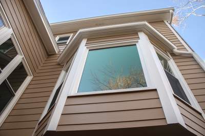 53 Window Replacements with Master 2800 Series Vinyl Replacement Windows and James Hardie Siding Installation