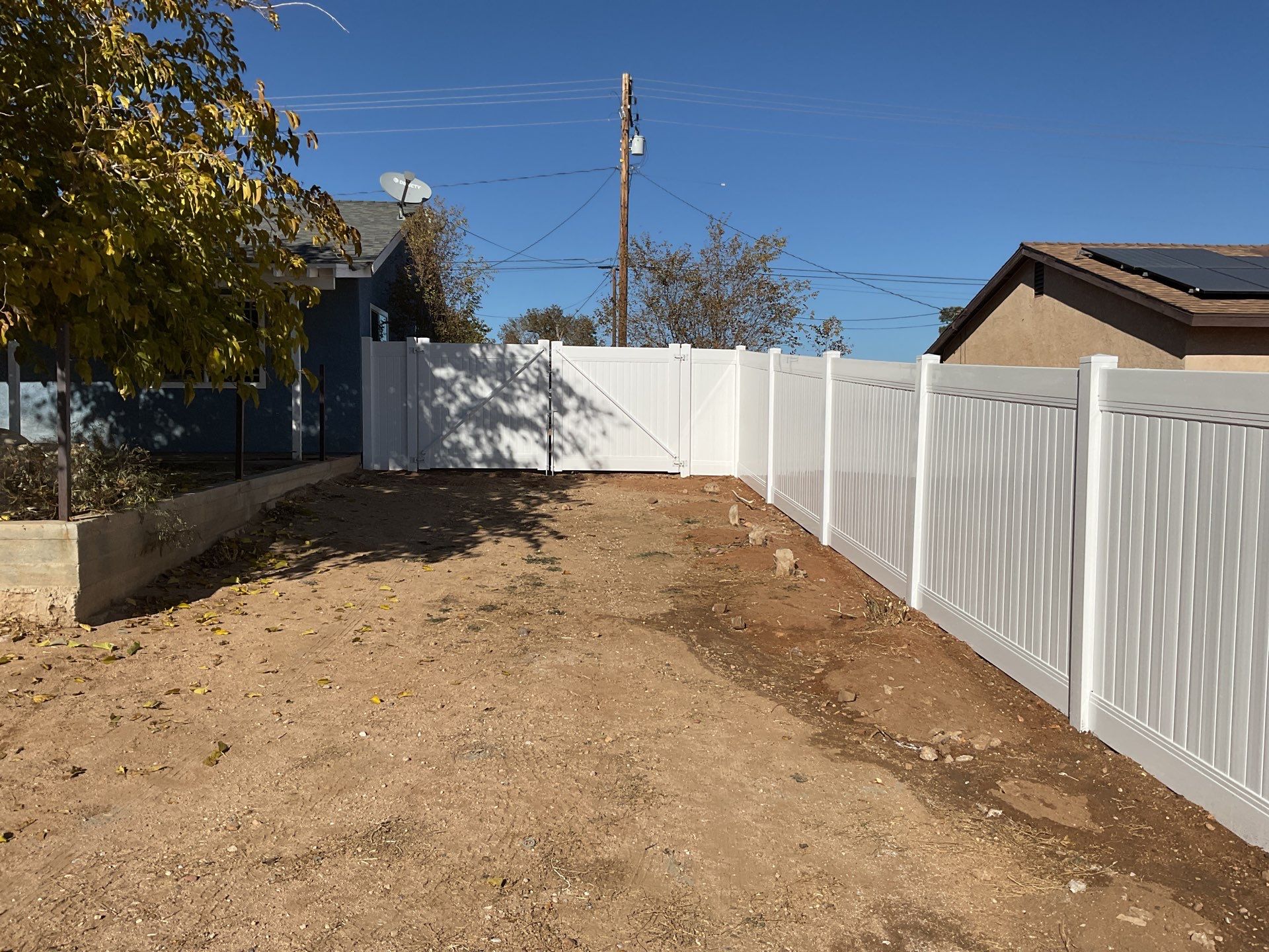 Fence Installation using vinyl and chain link  by Fence Guys Inc. 
