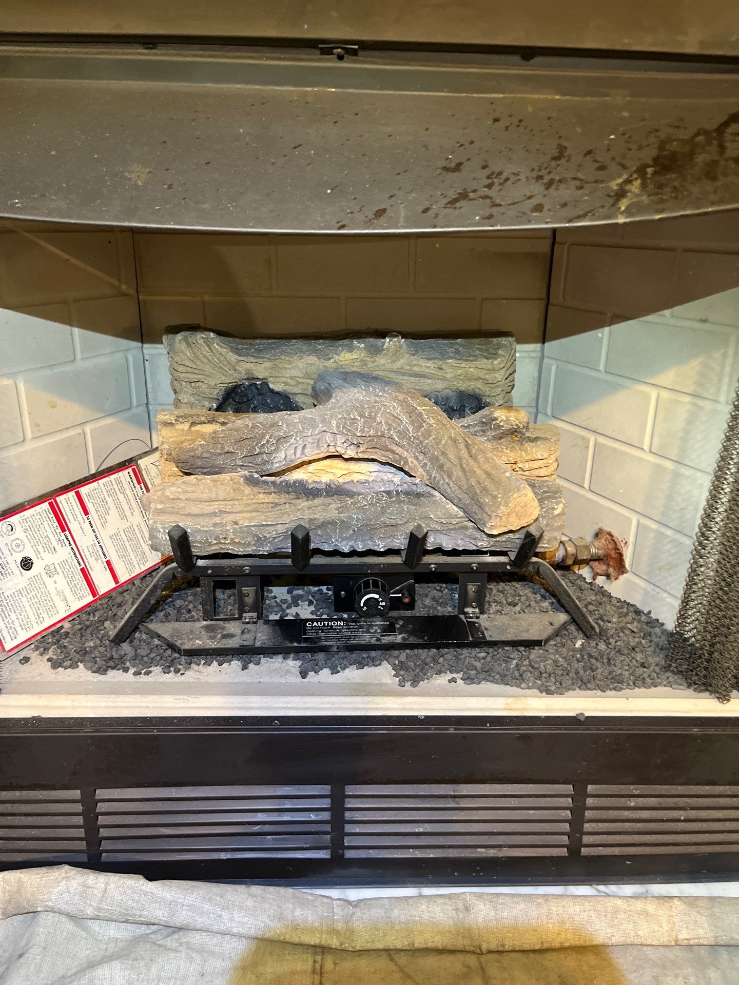 New Gas Logs Installation by Premier Chimney and Roofing