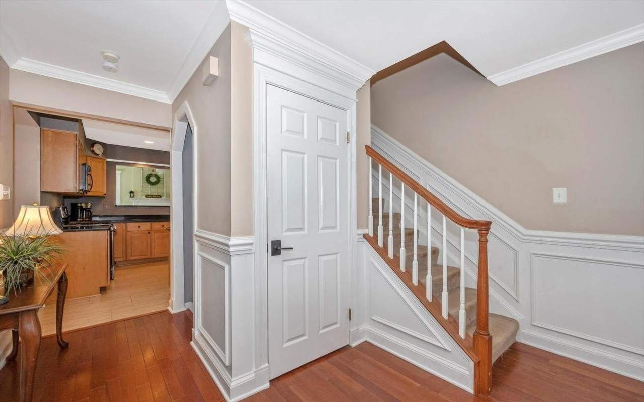 Flooring Installation using Maple Hardwood by Greenspring Construction Services