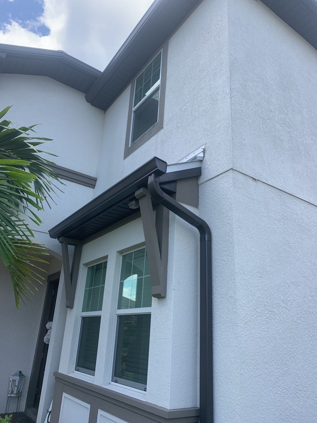 Black Seamless Gutters for Modern Homes in Naples FL  by Gutter Professors