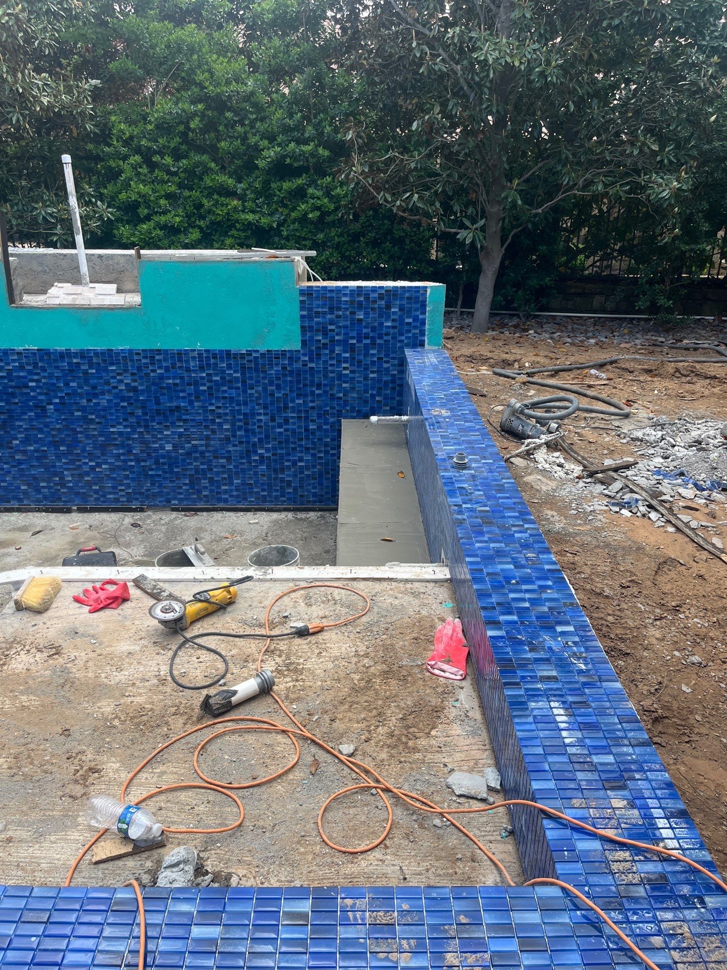 Geometric Pool with Raised Spa and Blue Tile by Pinnacle Pools and Spas - DFW