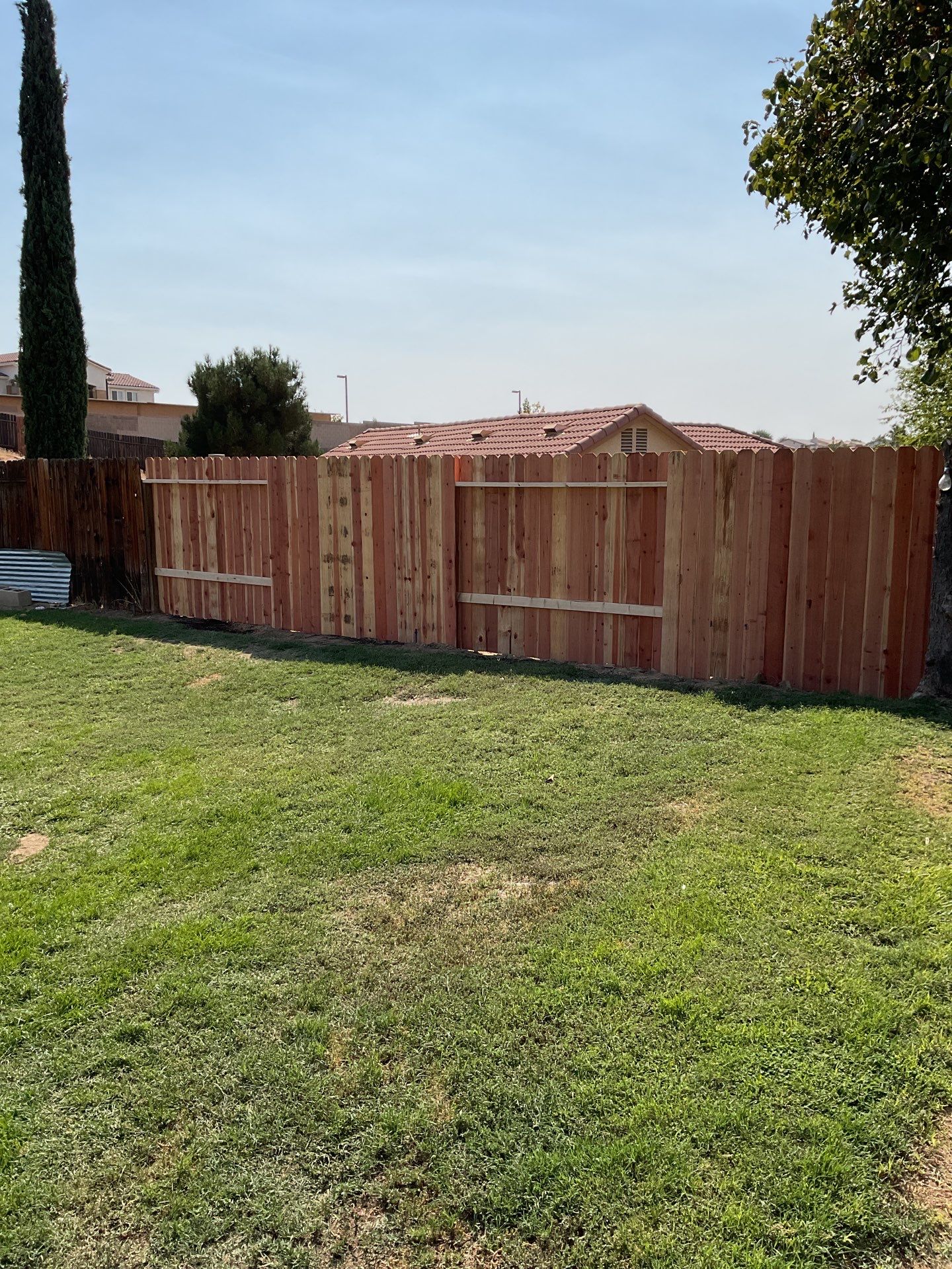 Fence Installation using Wood by Fence Guys Inc.