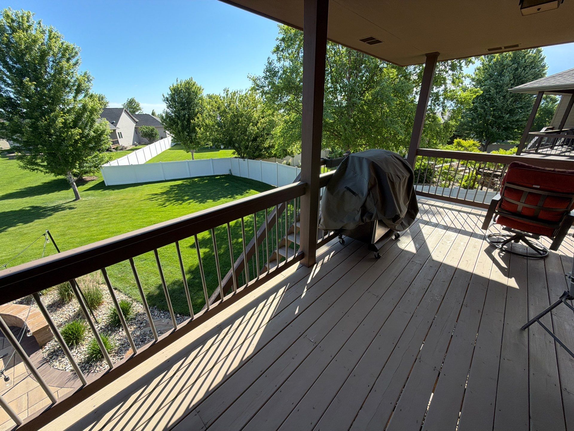 Sioux Falls Exterior Refresh and Multi-Level Deck Maintenance by Select Painting, Coatings & Garage Cabinets