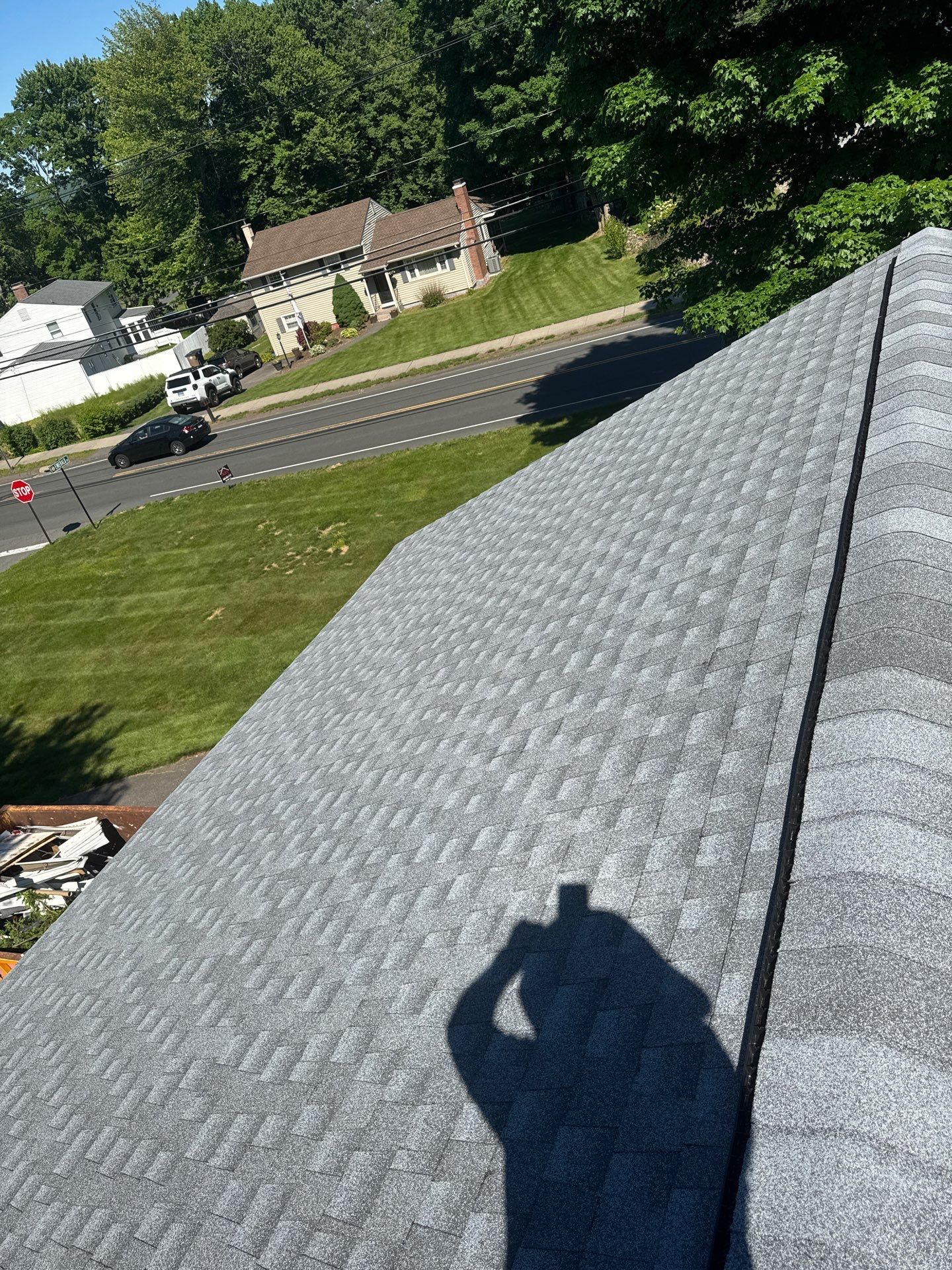 Beautiful new asphalt shingles on a roof in Vernon! by DiGiorgi Roofing and Siding Inc