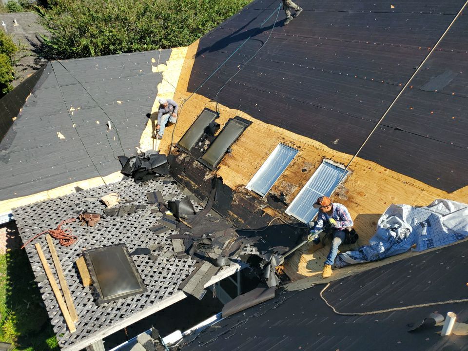 Residential Roofing Installation using Roof Replacement by American Roofing & Construction LLC