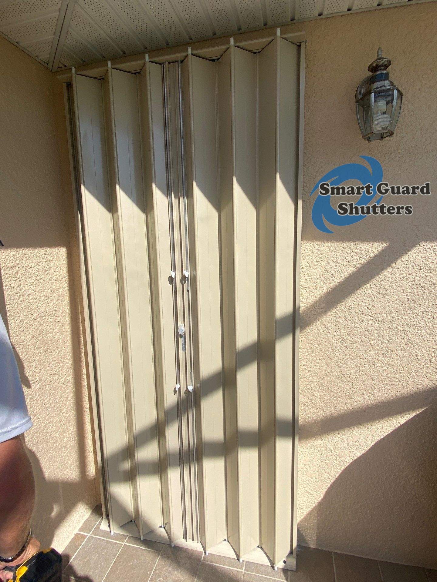 Accordions in Beige by Smart Guard Shutters