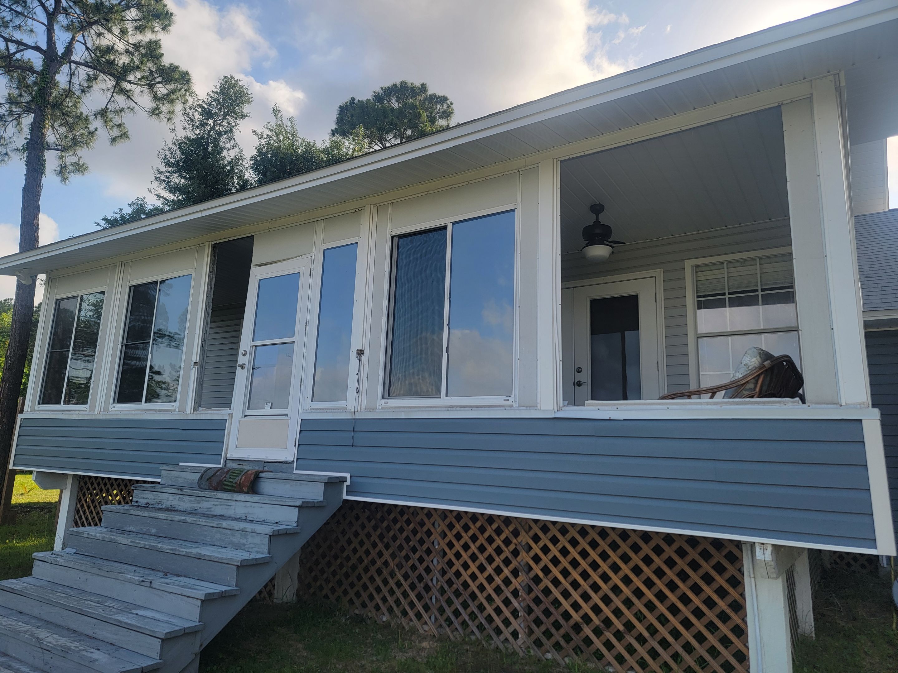 Glass Under w/Stairs in Milton by Titan Sunrooms