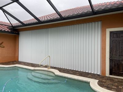 Lanai opening using accordion shutters