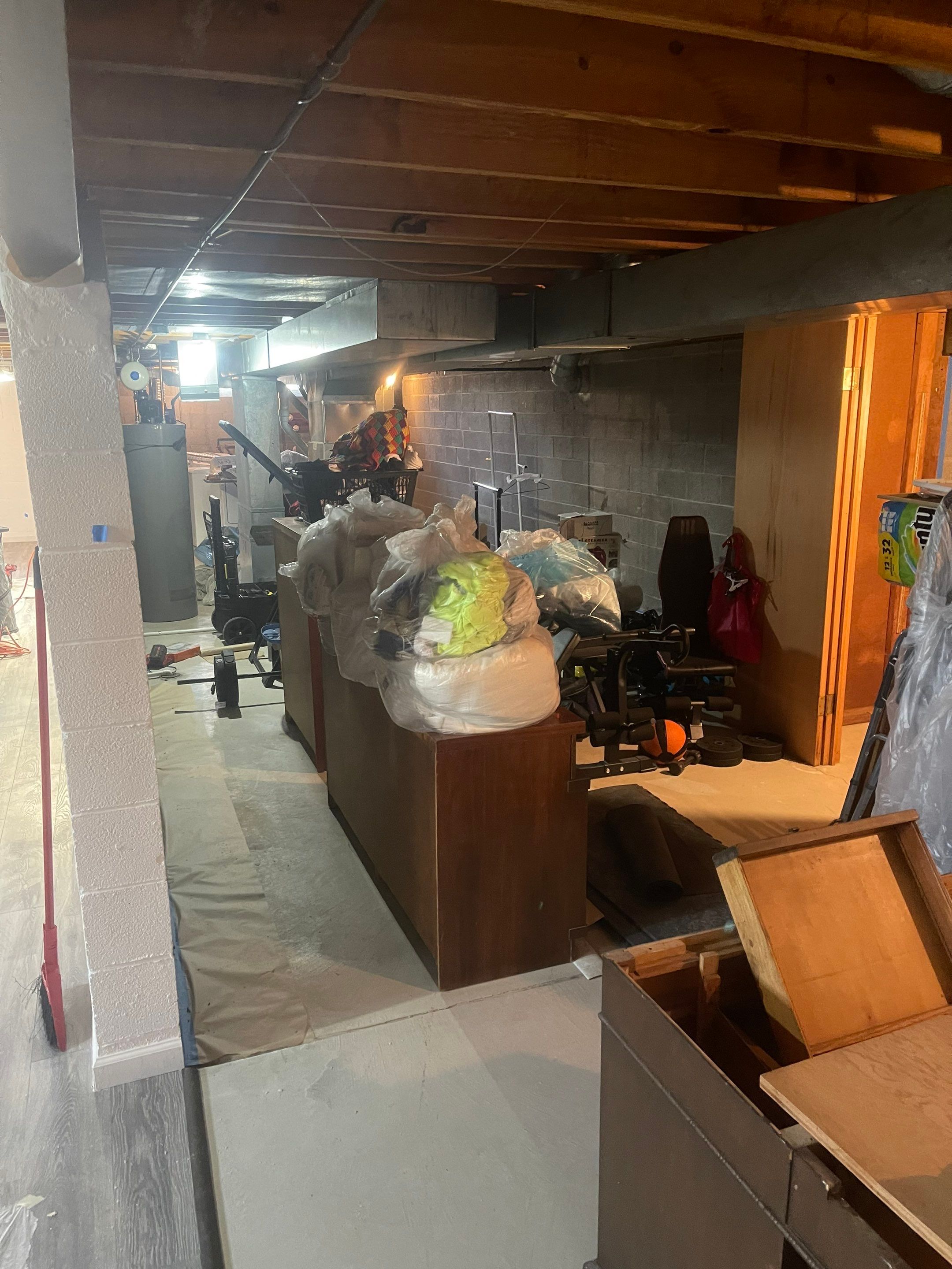 Flooring Installation and Basement Wall Painting using DryLok Extreme by Callaway Contracting LLC