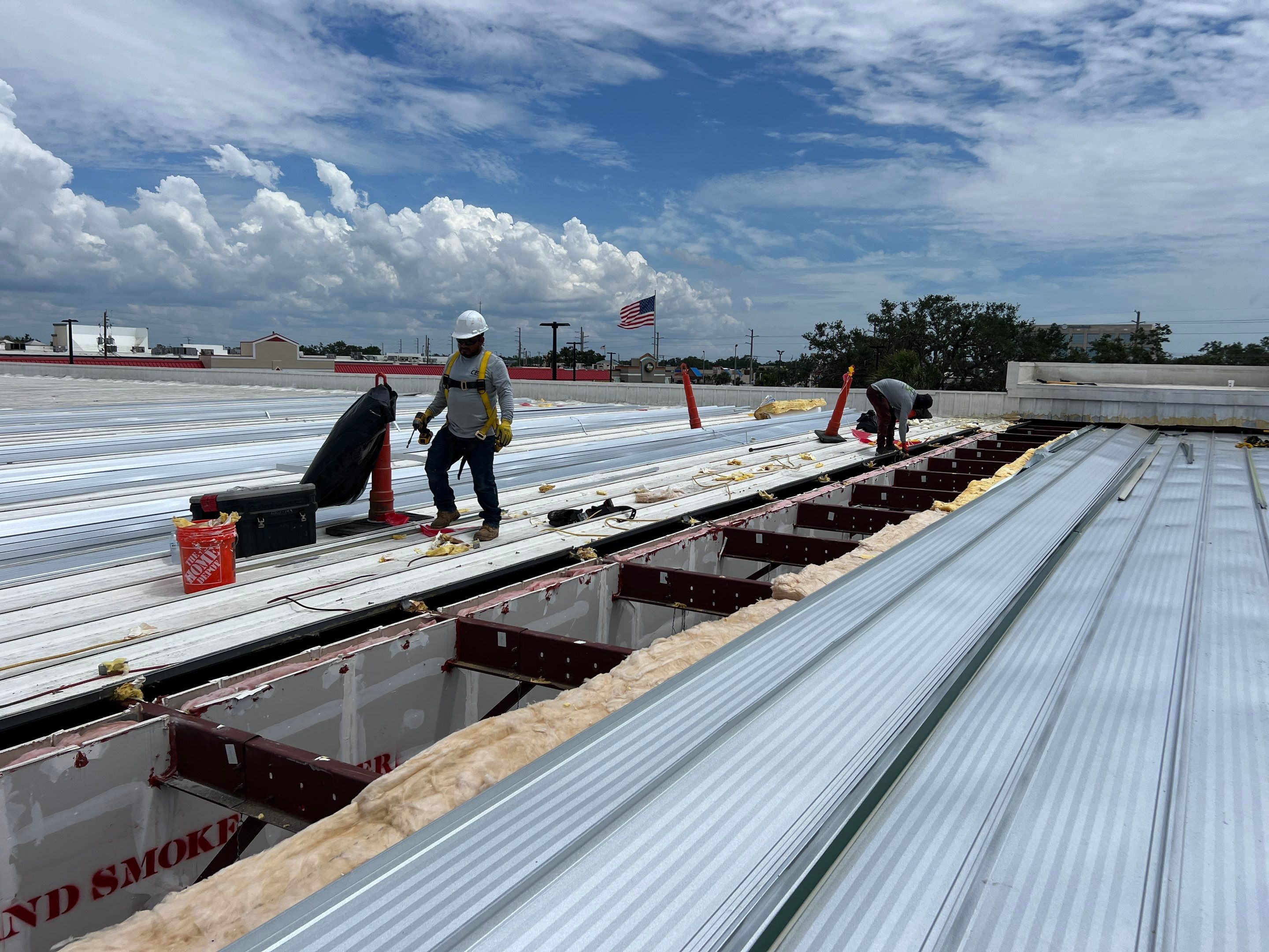 Commercial Metal Roof Replacement at Shopping Plaza in Port Charlotte by CES Roofing