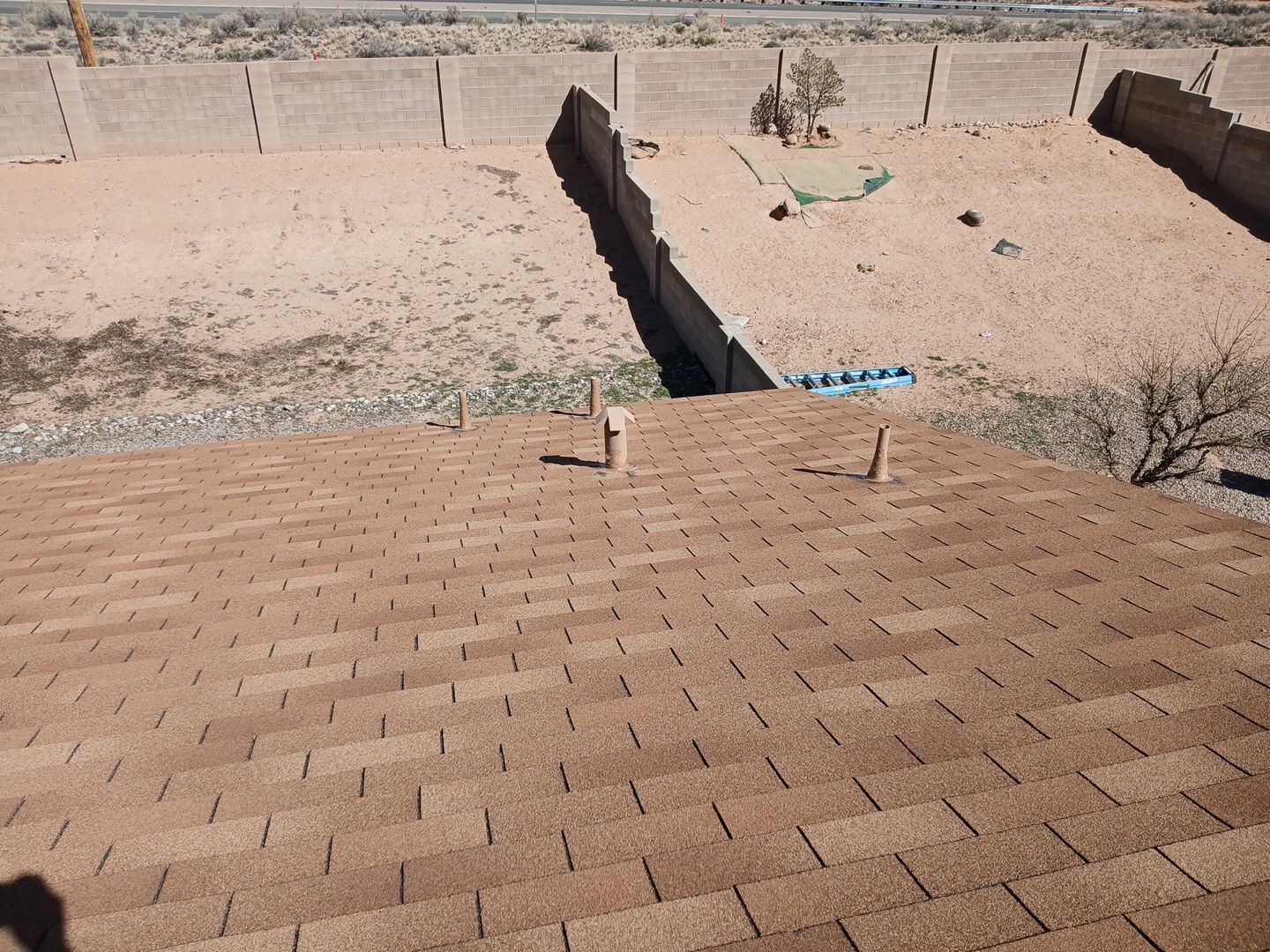 Wind damage repairs and maintenance in Rio Rancho by Doyle Roof Masters Inc