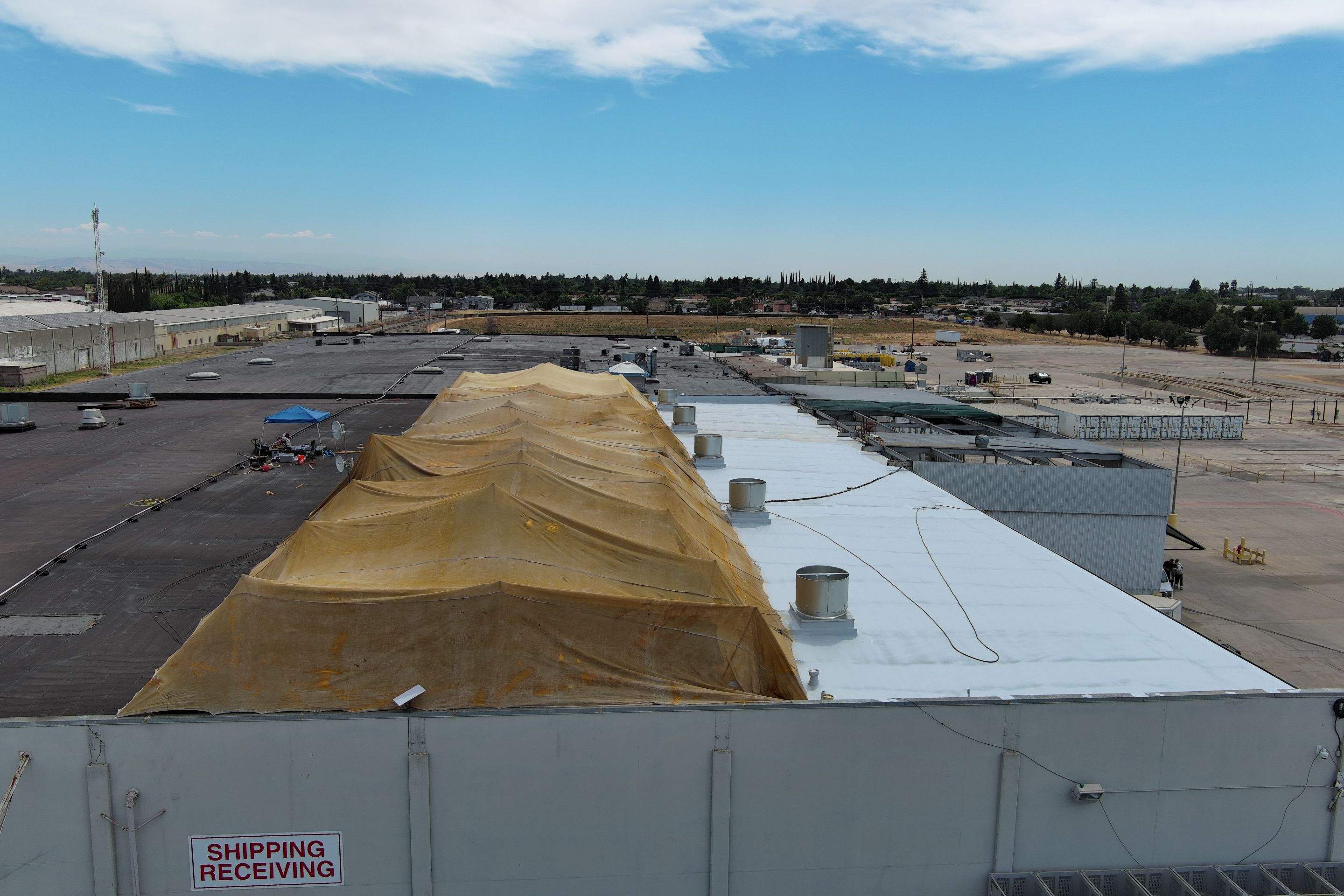 Pro Farms Spray foam roofing project by Straight Edge Roofing Inc