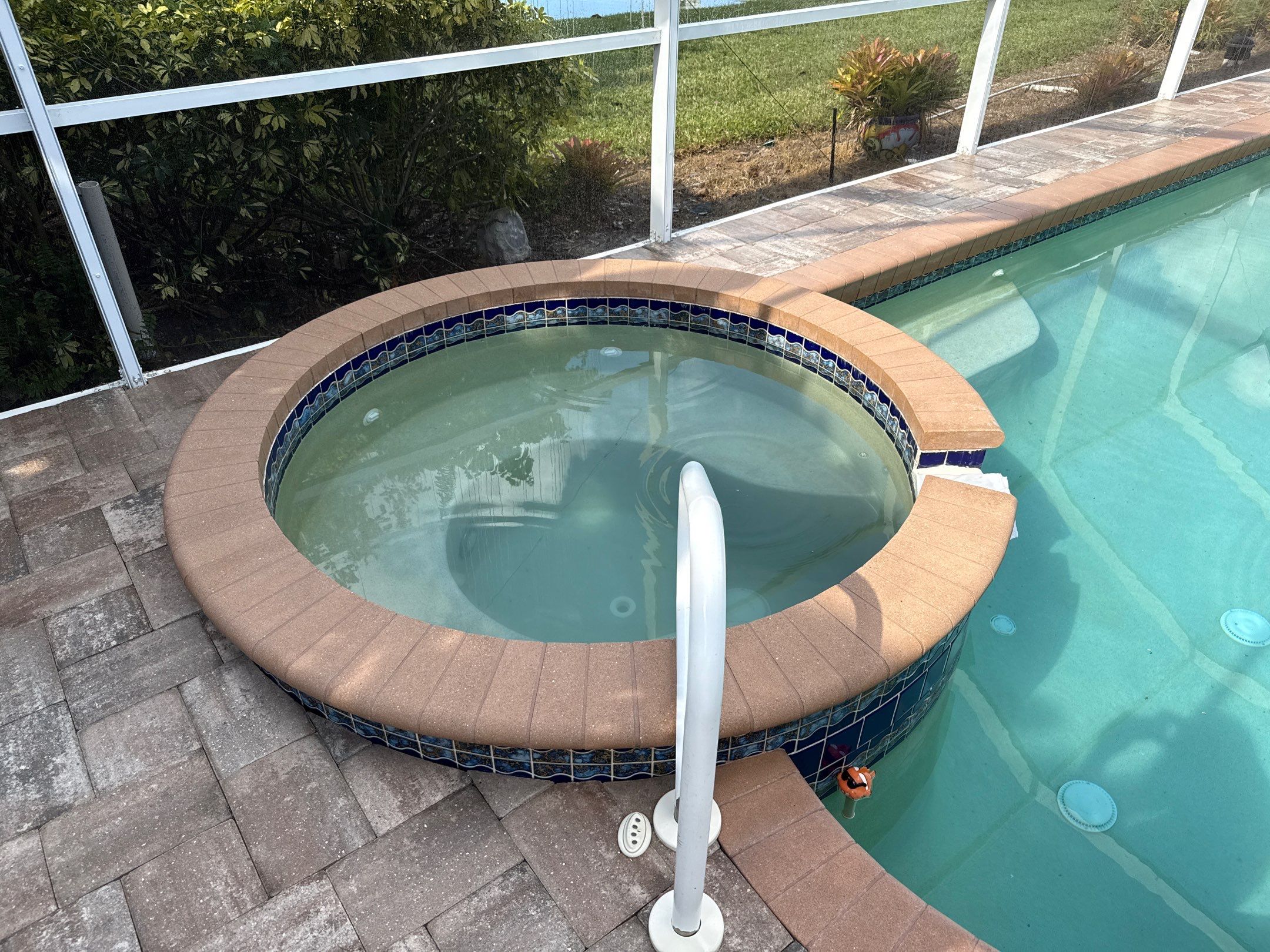 Paver Pool Deck & Screen Enclosure Transformation | University Park, Sarasota FL by Sunshine AquaWash